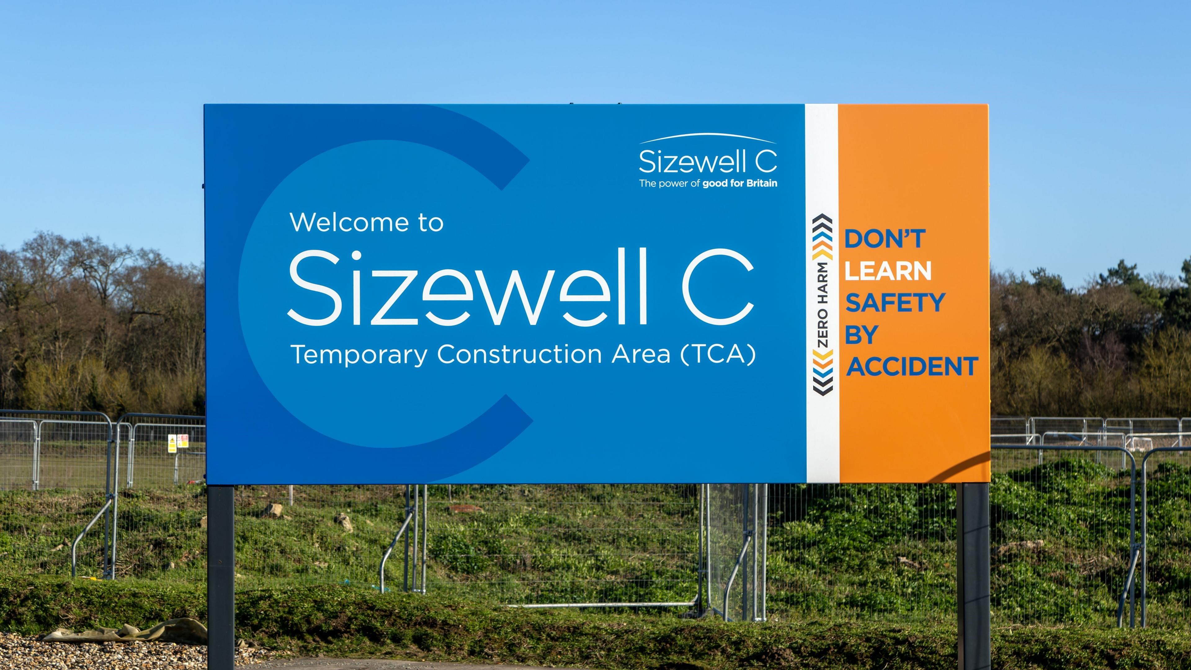 Large blue and orange sign saying 'Sizewell C temporary construction area'