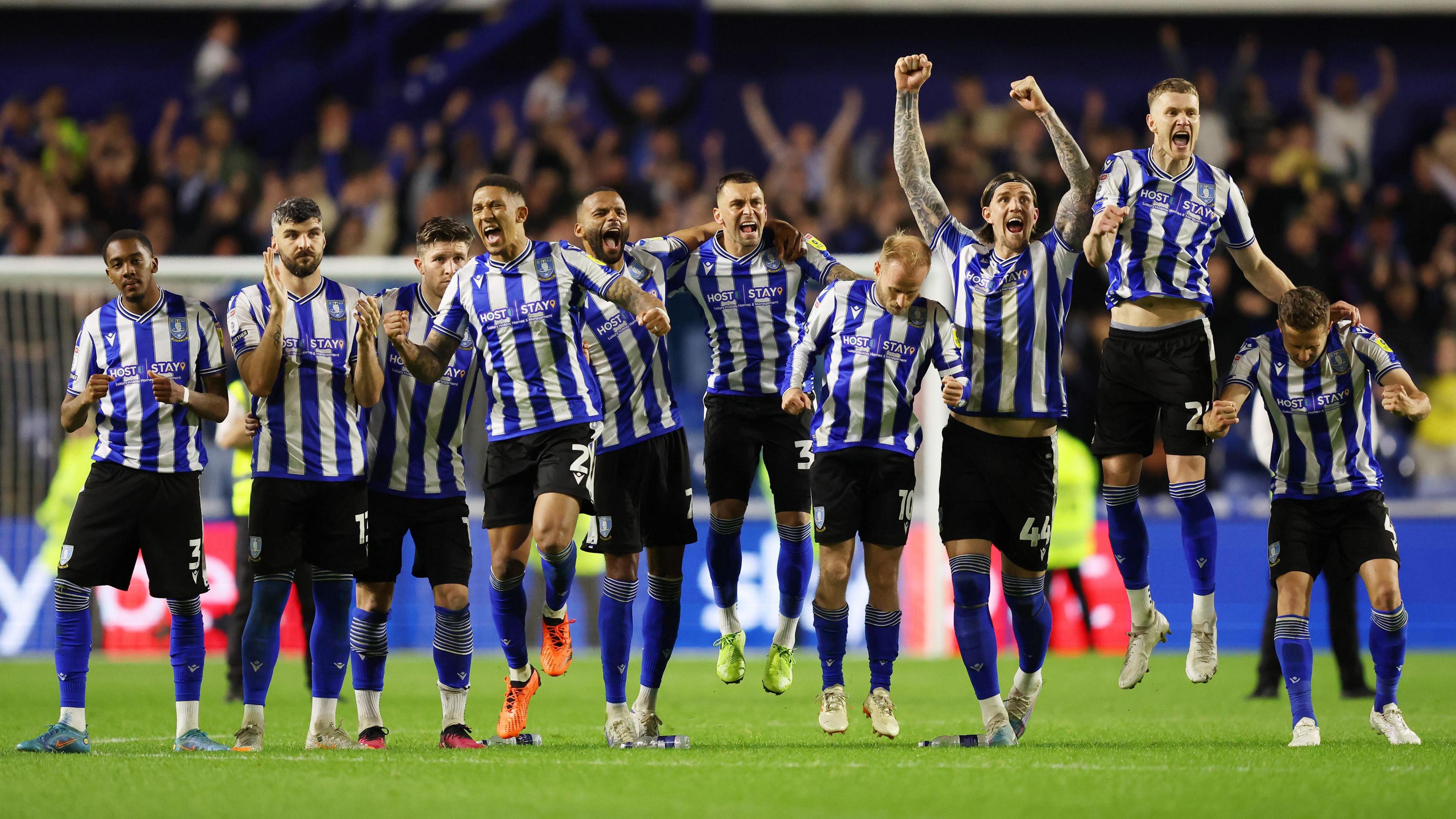 Sheffield Wednesday celebrating during their penalty shootout against Peterborough in 2023