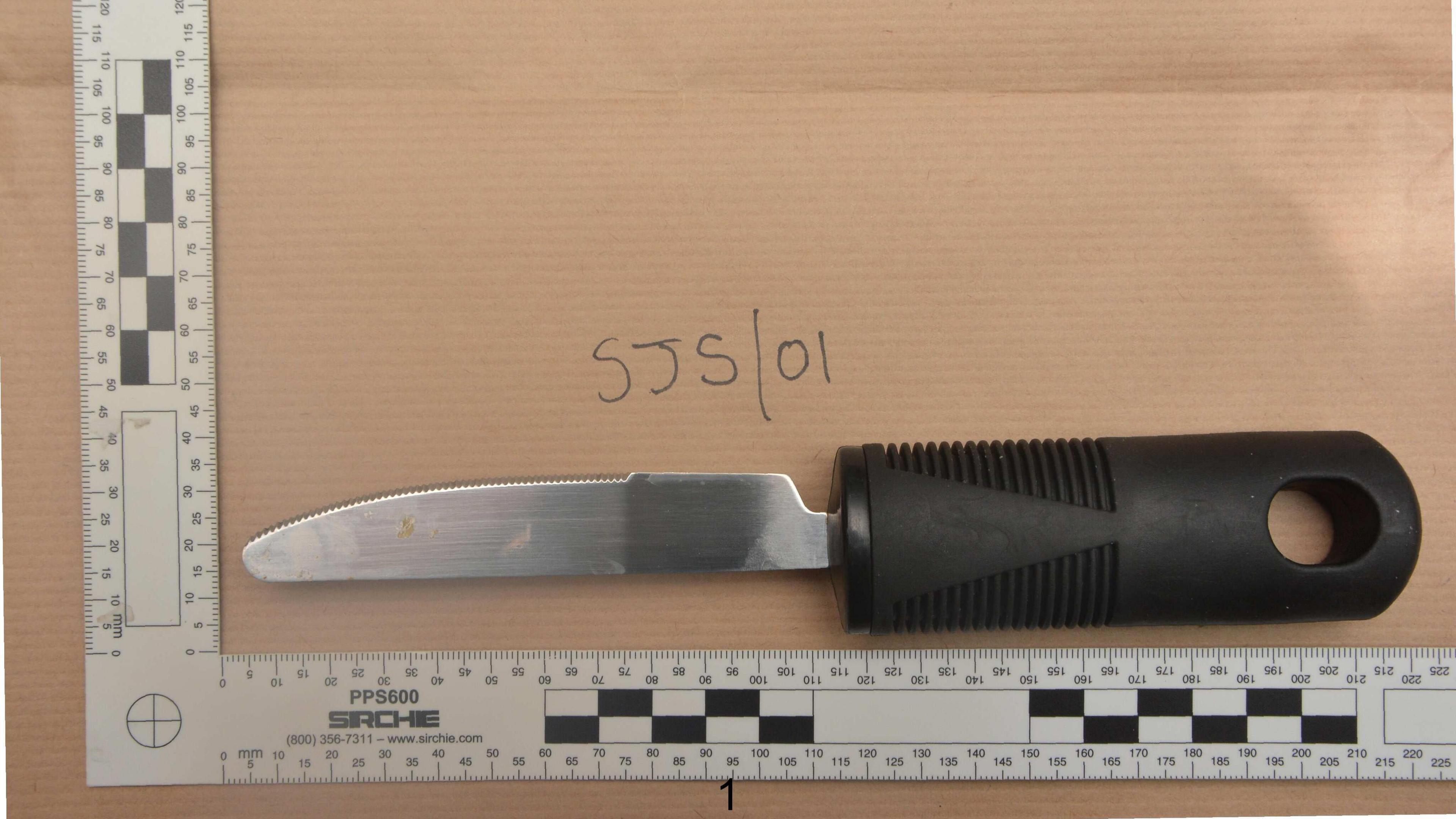 A knife with a black handle