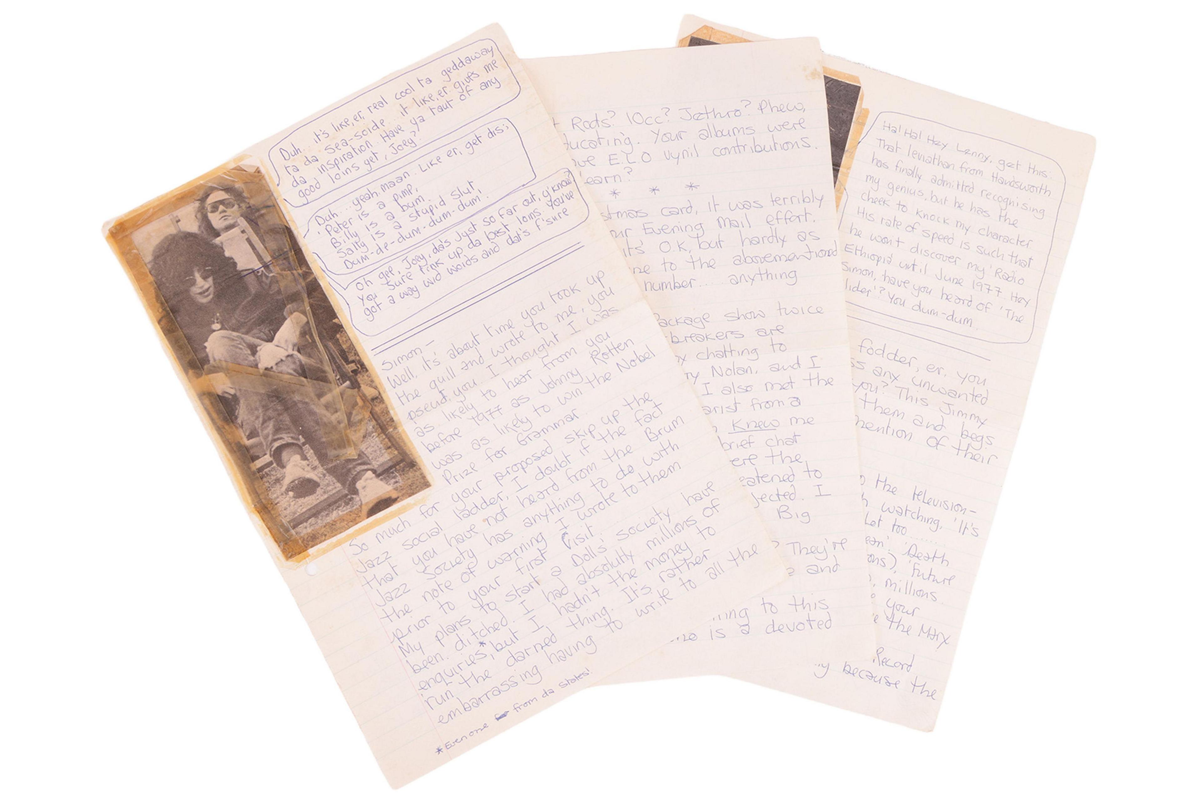 Three letters fanned out. There is a picture in the top left on the first one.