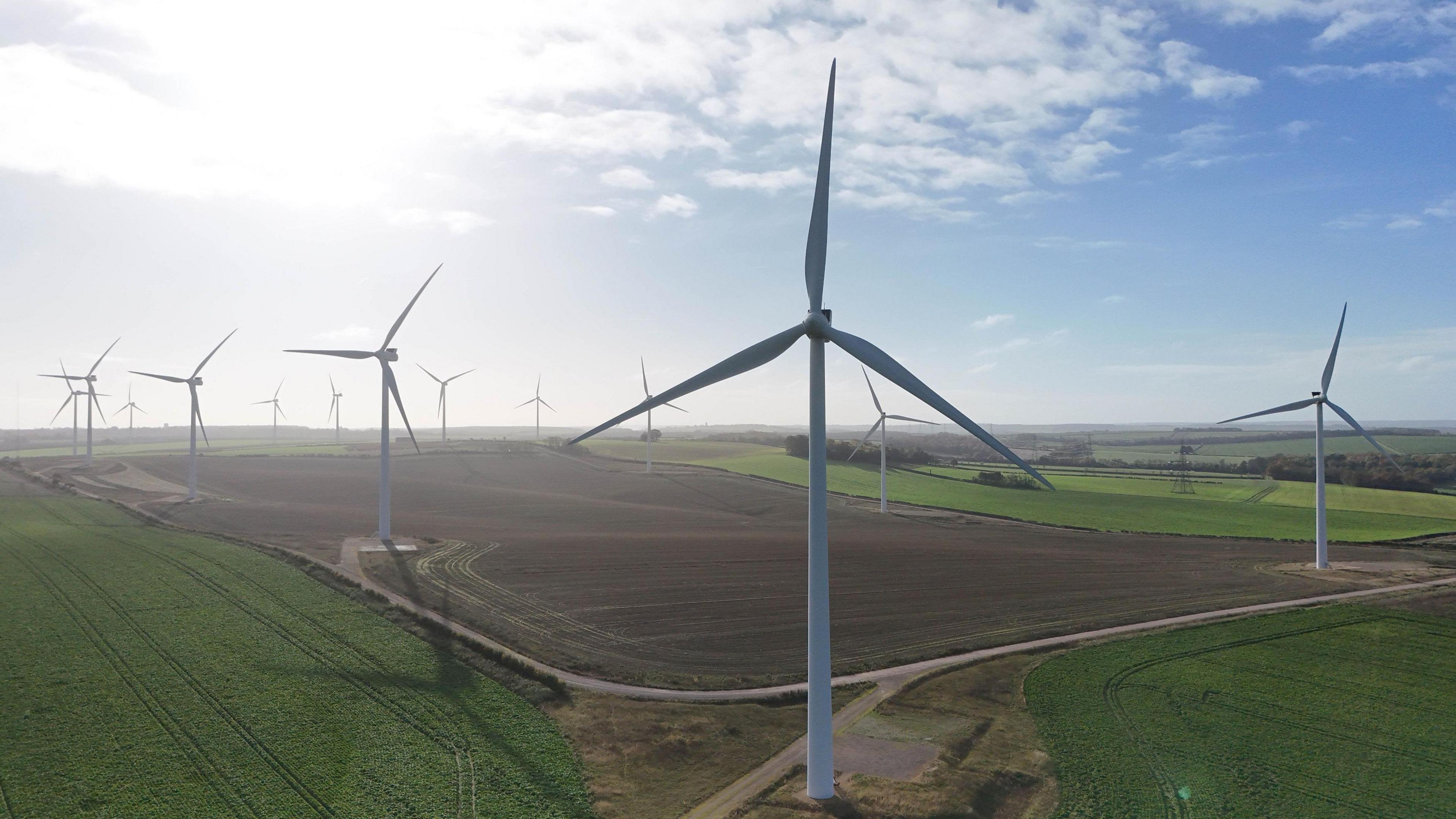 Wind turbines in a field.