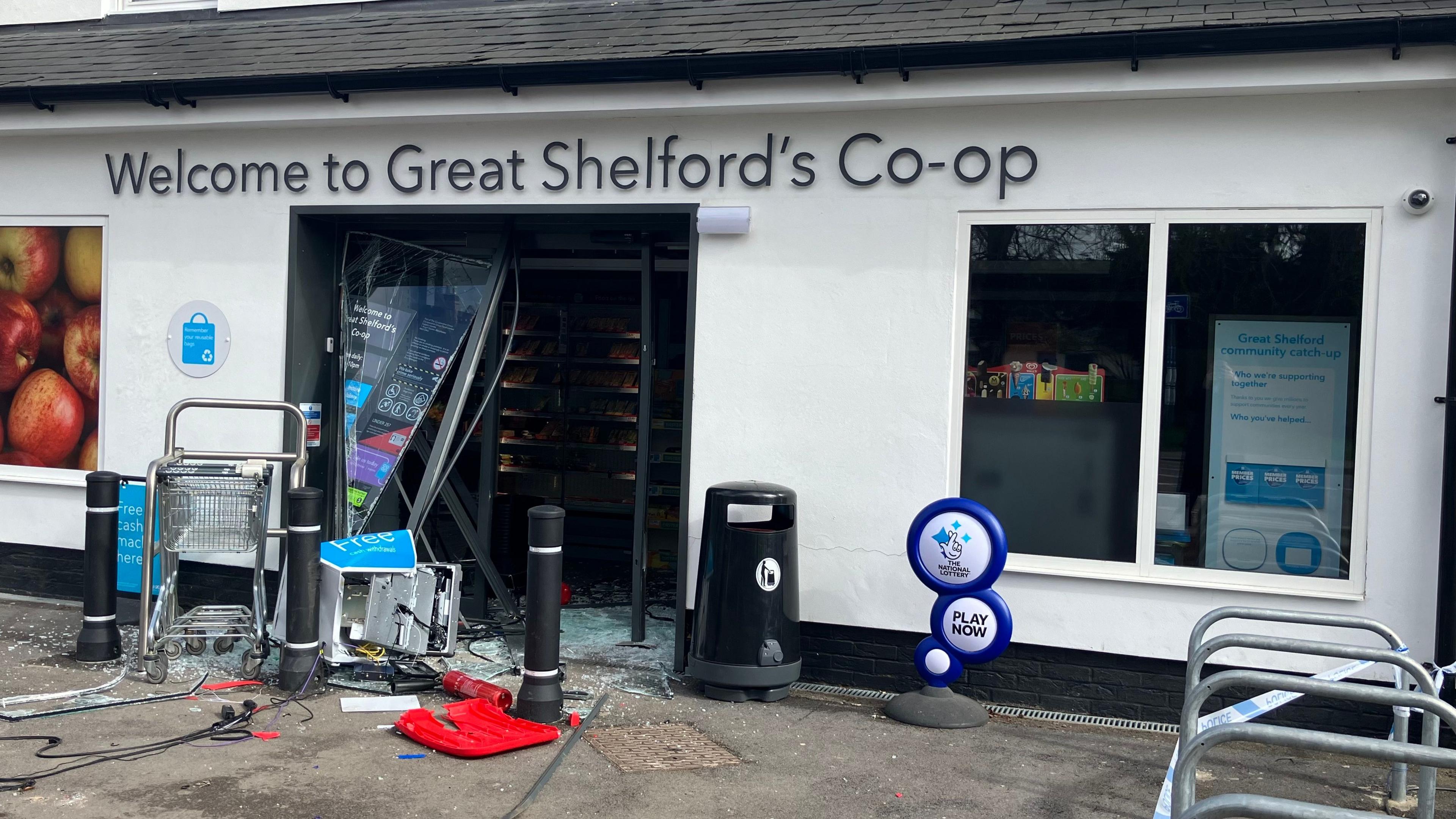 Great Shelford's Co-op branch with a broken down door