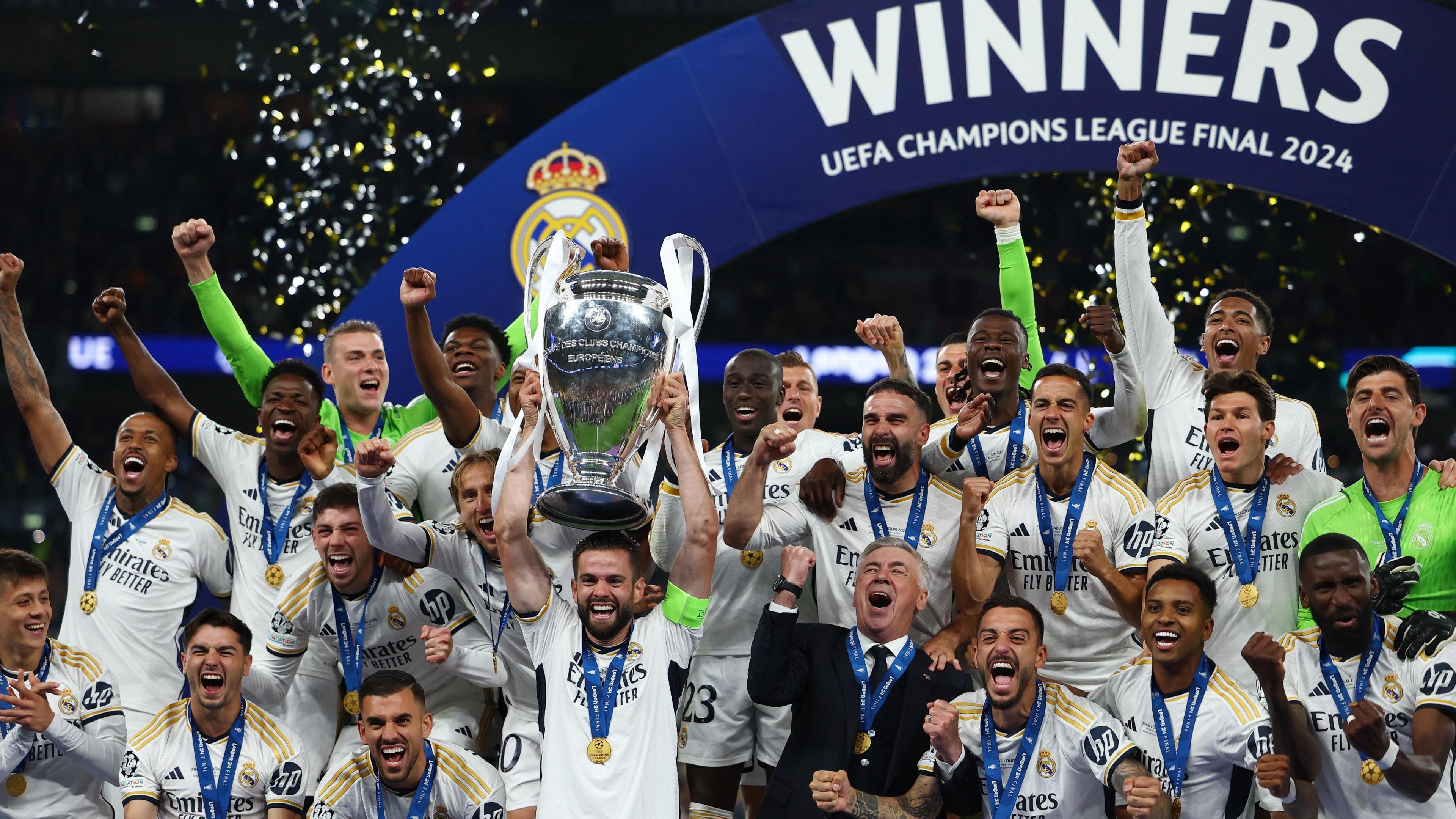 Real Madrid lift the Champions League trophy