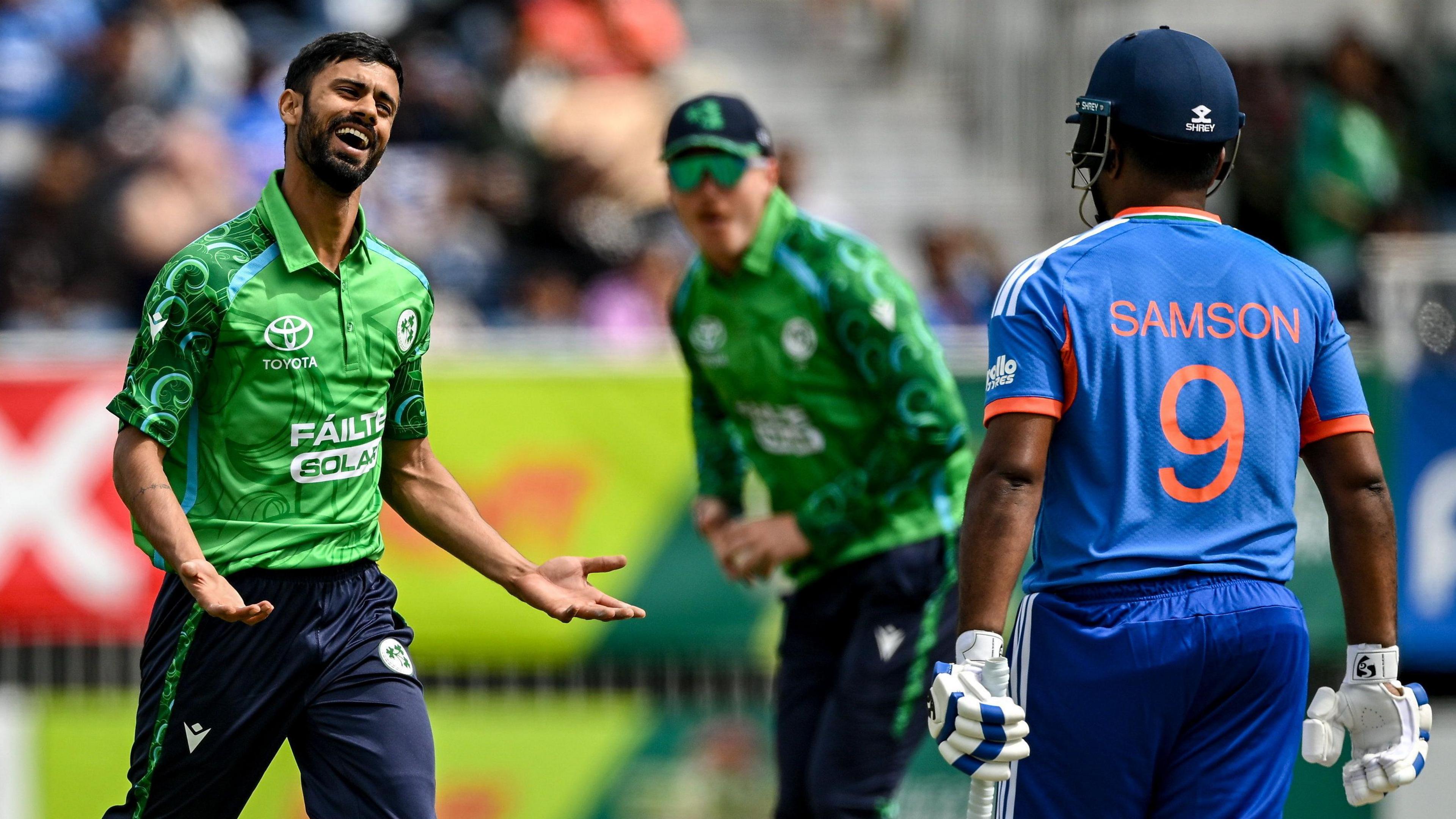 Jai Moondra celebrates taking the wicket of Indian opener Sanju Samson 