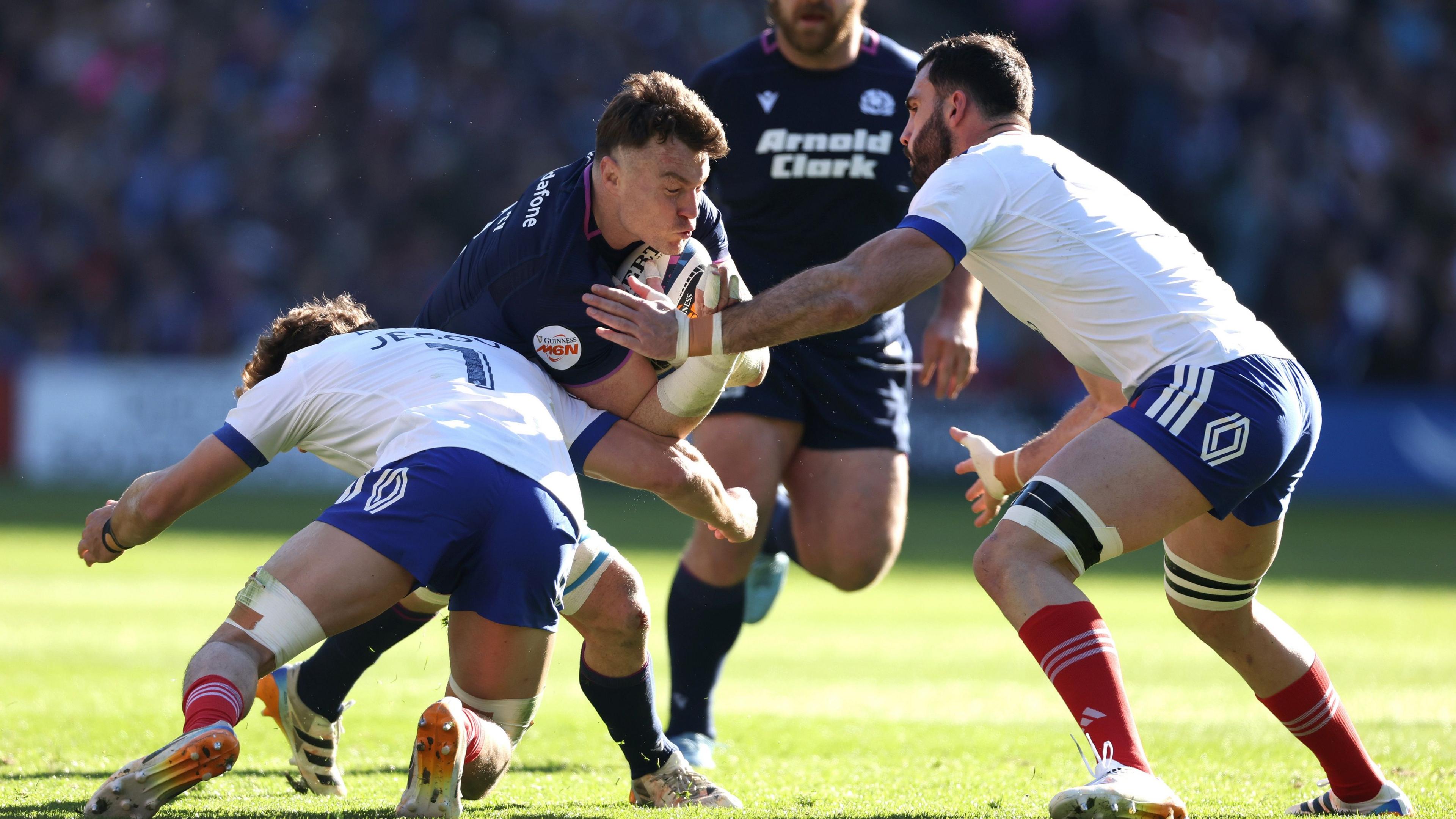 Scotland number eight Jack Dempsey takes contact during Scotland's win over France