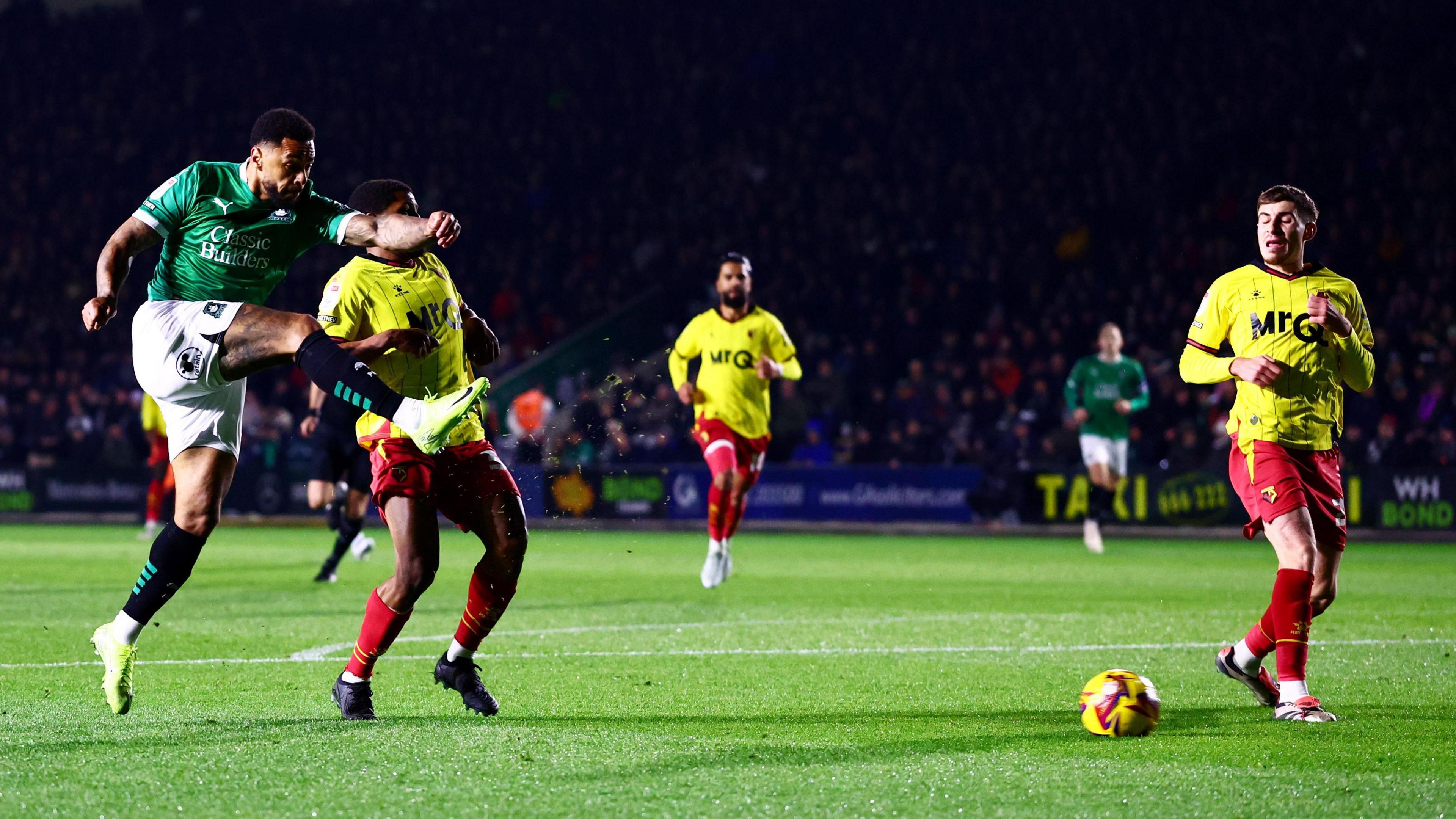 Andre Gray volleys in Argyle's opener