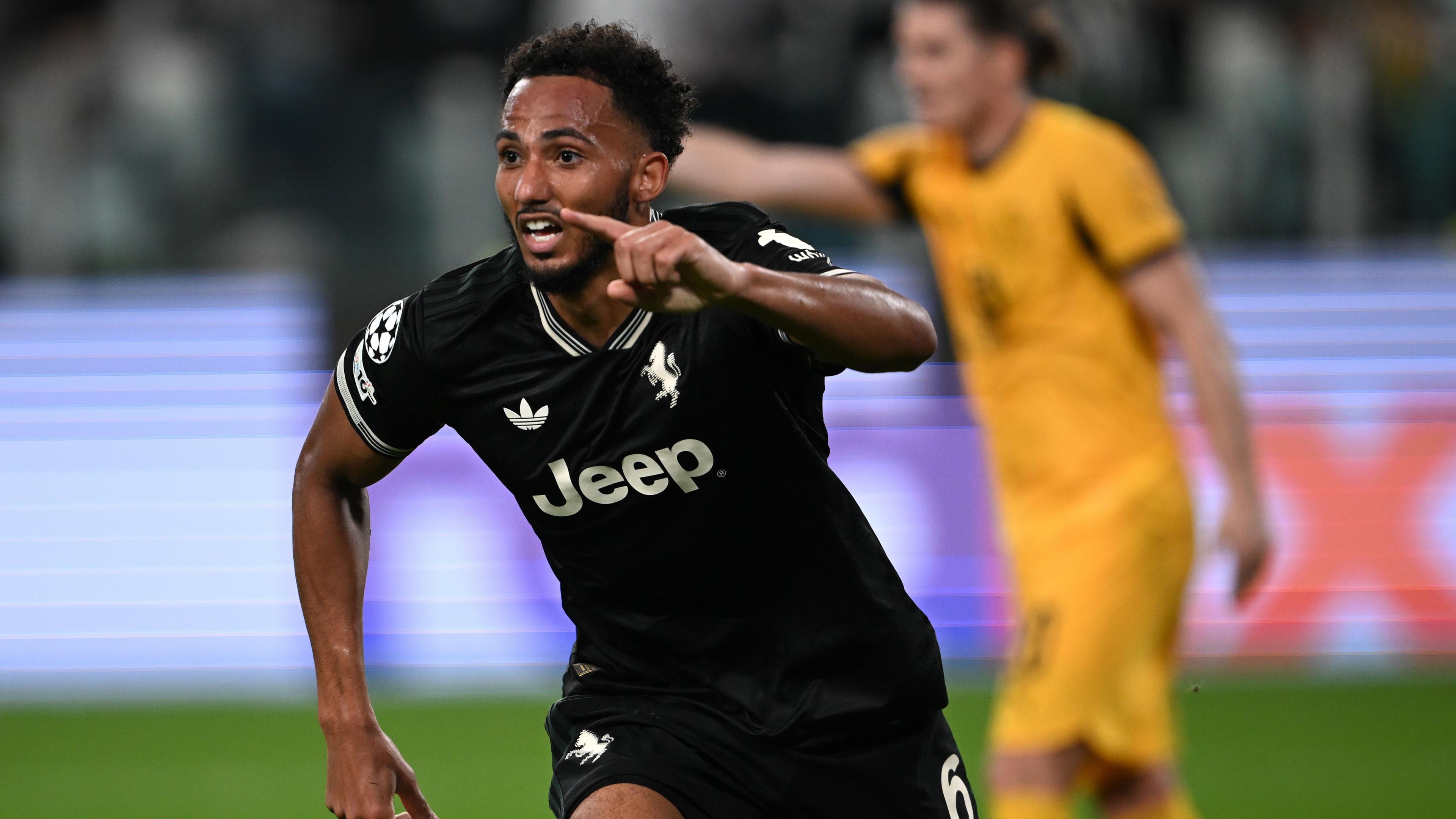 Lloyd Kelly celebrates scoring an equaliser for Juventus against Dortmund