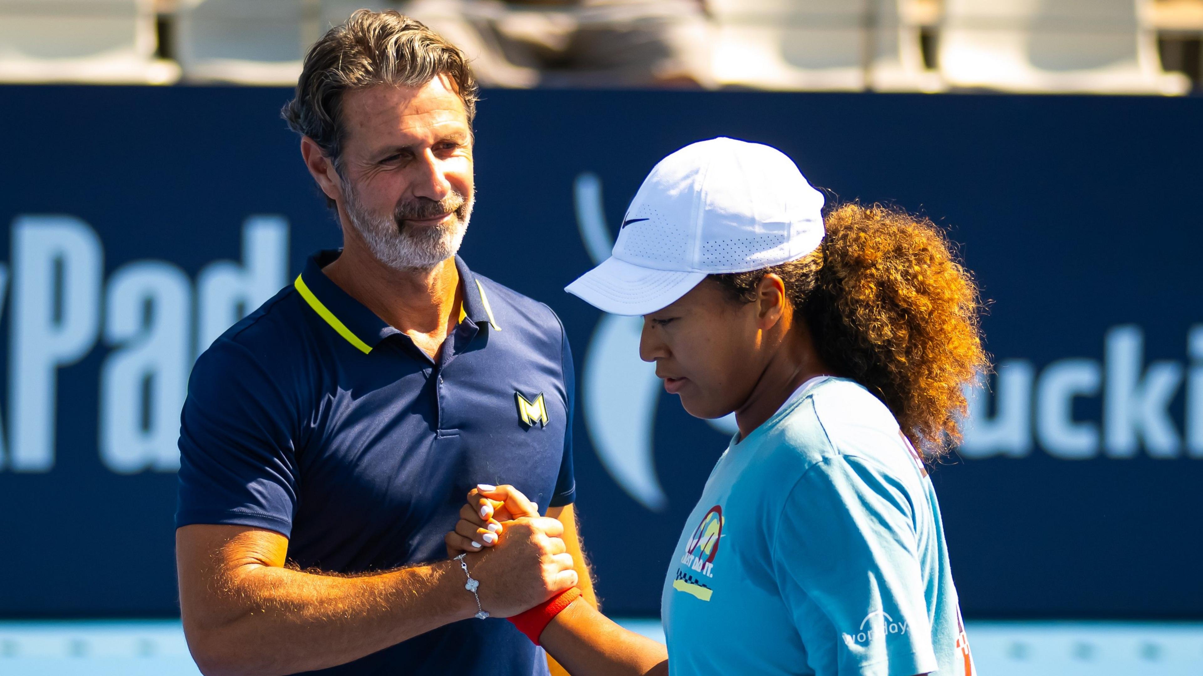 Naomi Osaka and Patrick Mouratoglou during a practice session at the China Open