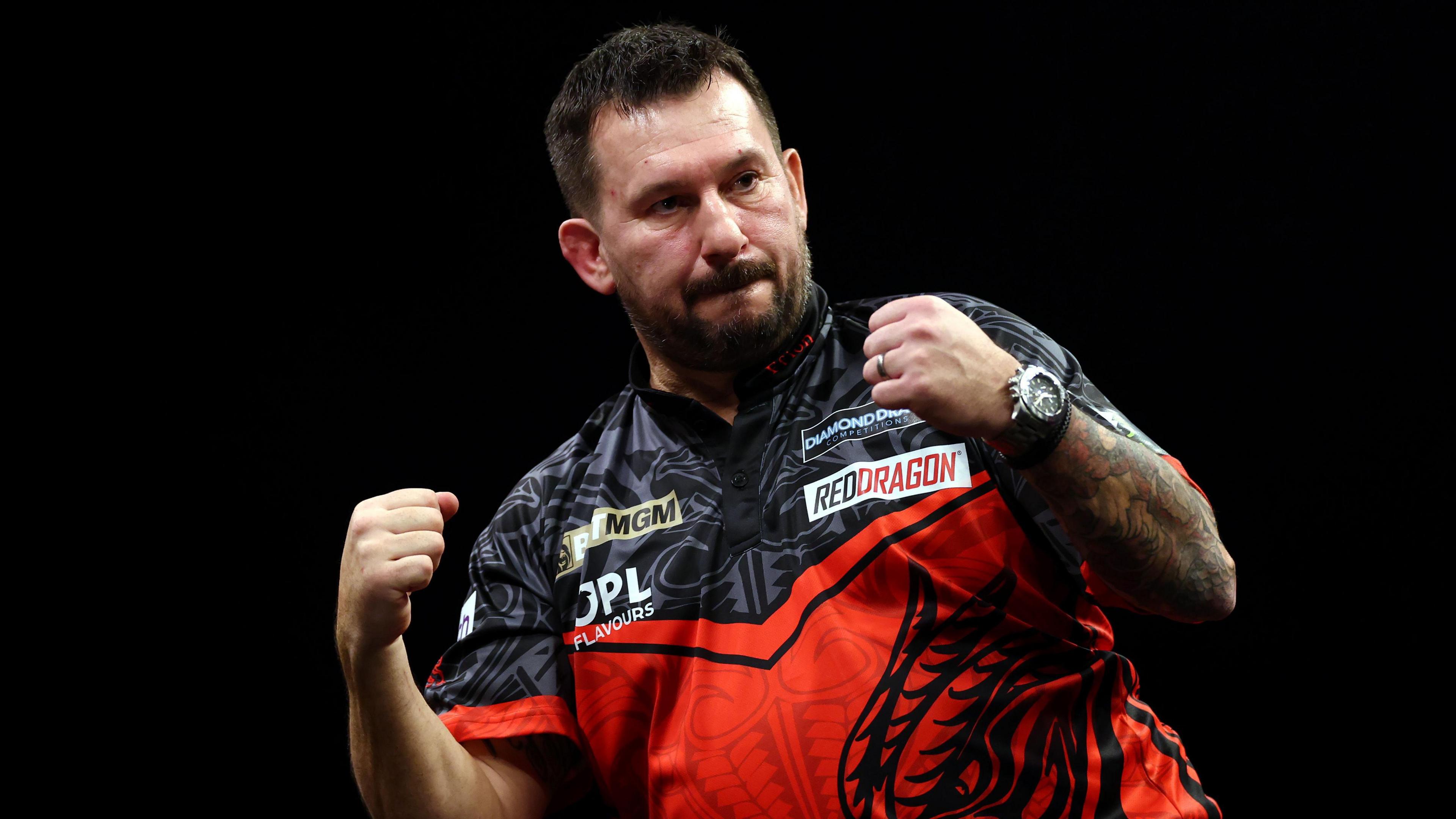 Jonny Clayton celebrates his Premier League win in Cardiff