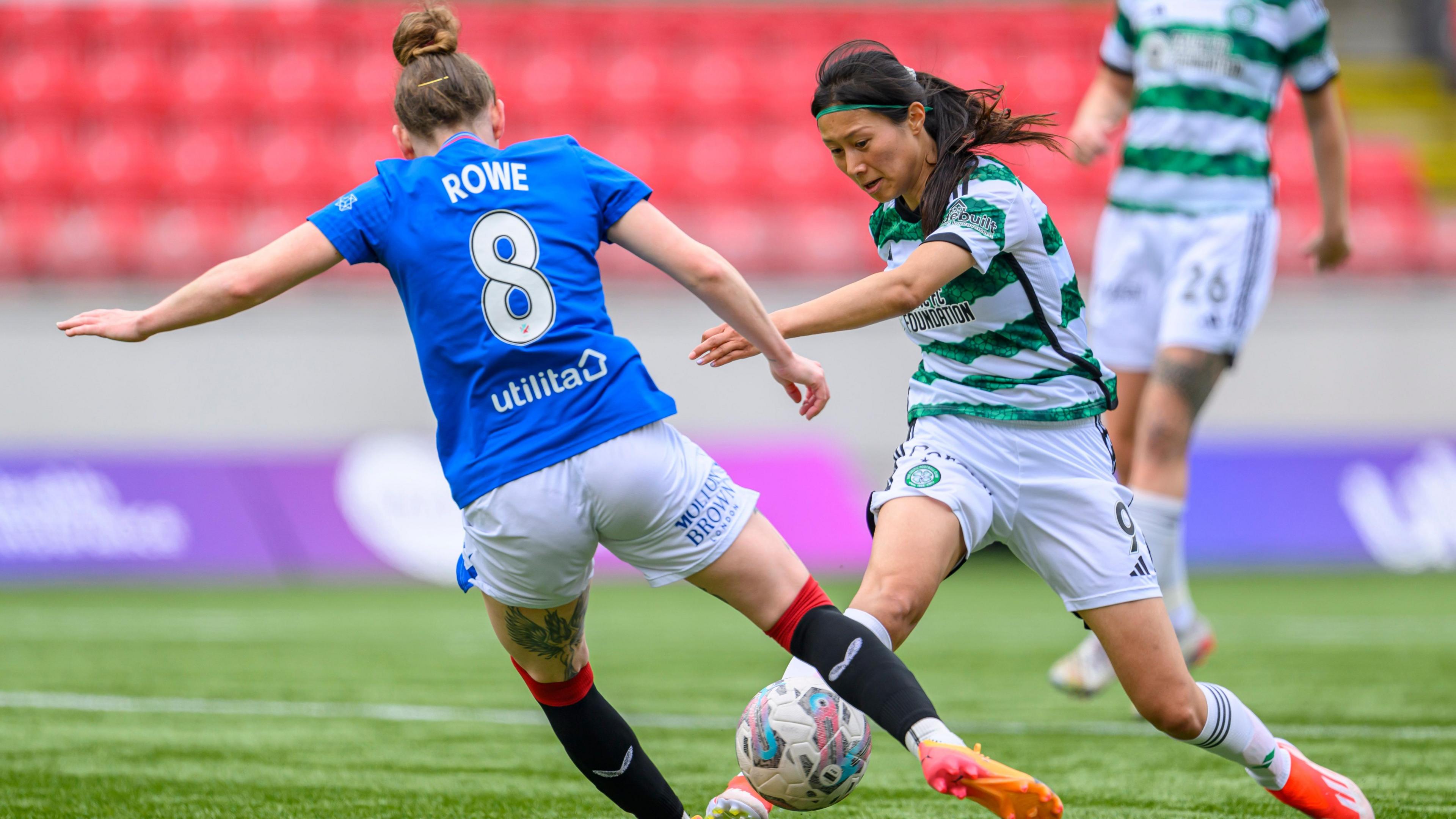 Rangers' Rachel Rowe contests with Celtic's Shen