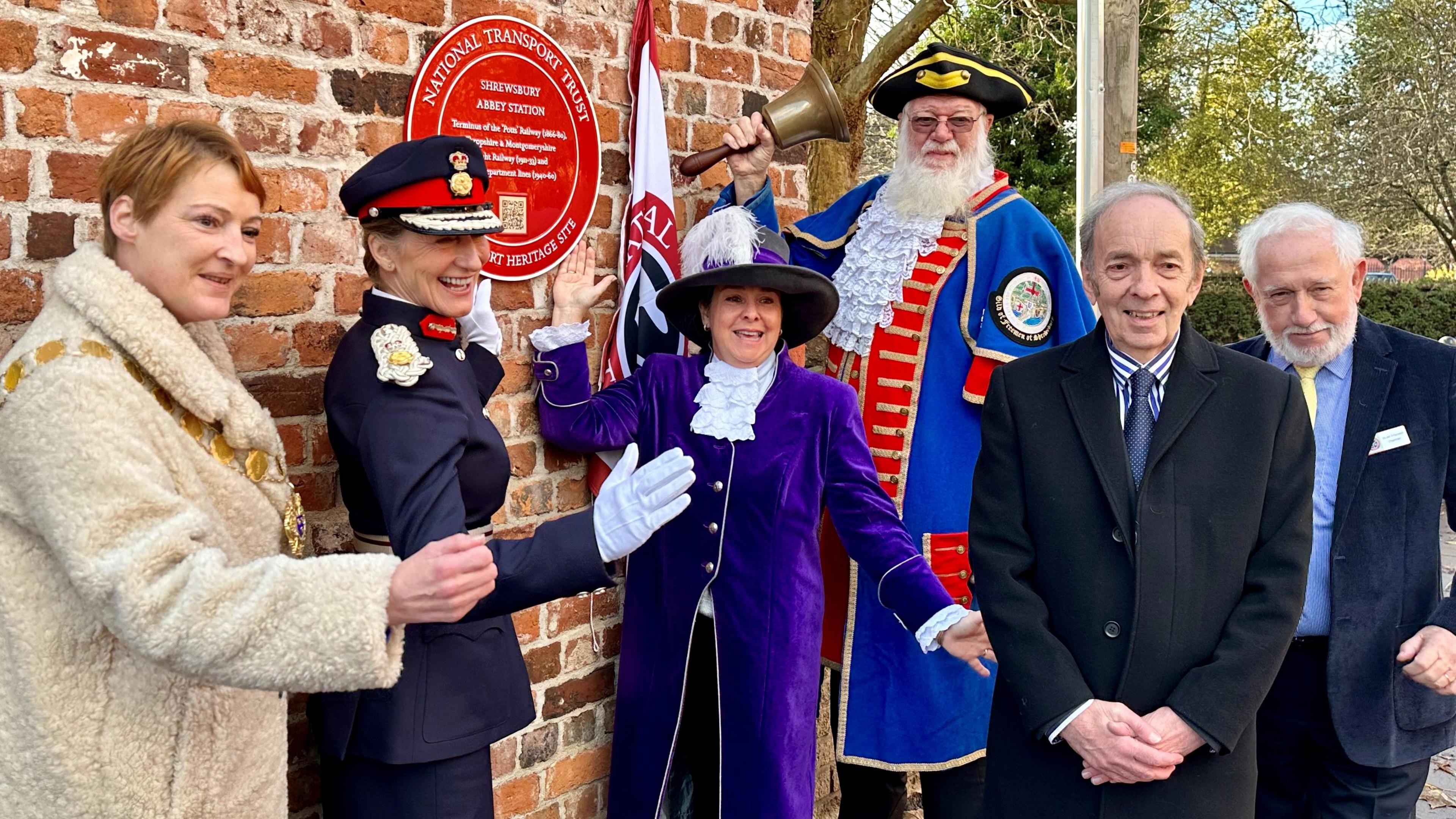 dignitaries at plaque unveiling