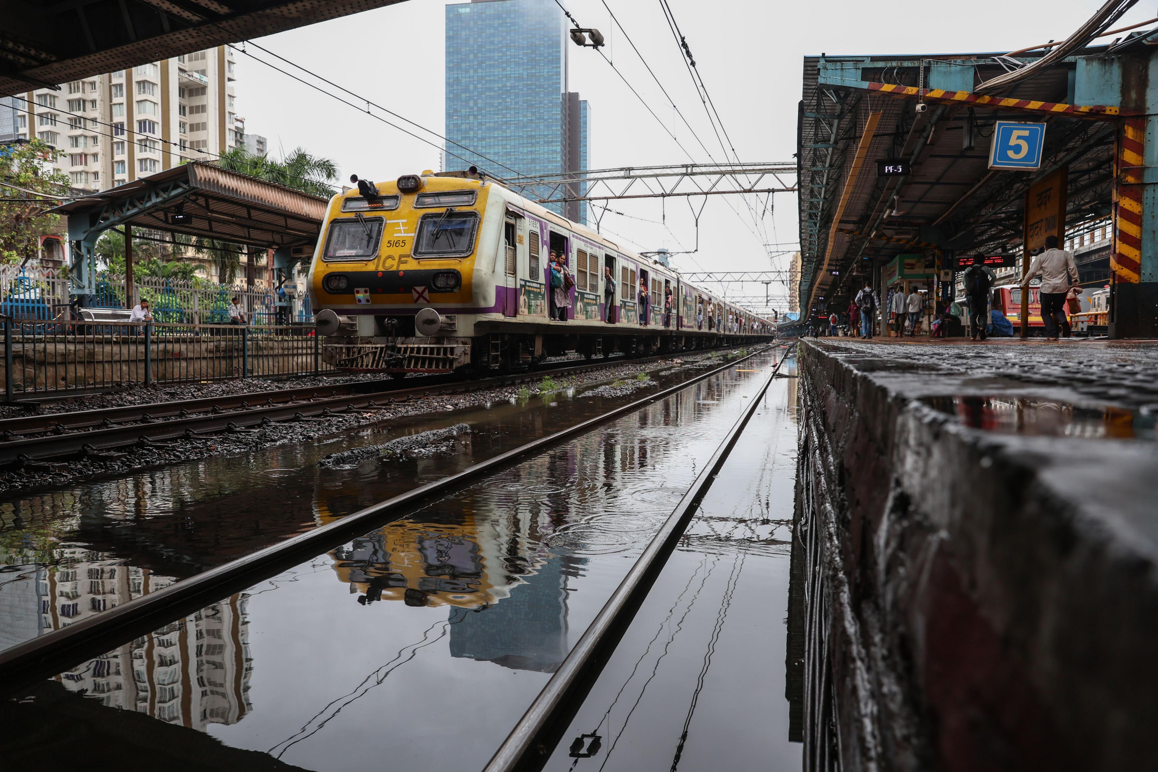 Flooded railway tracks during heavy rain in Mumbai, India.