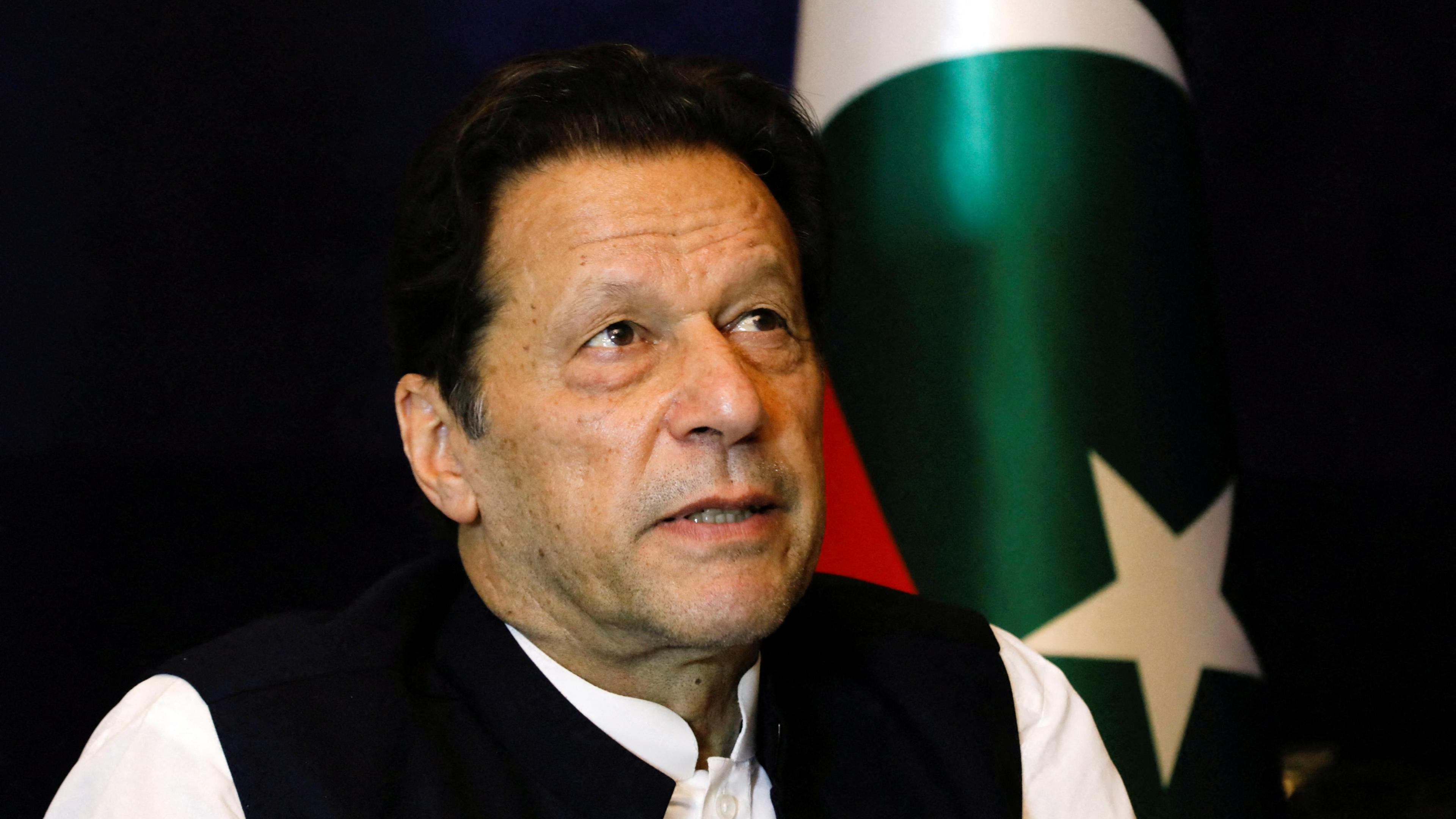 Former Pakistani Prime Minister Imran Khan pauses as he speaks with Reuters during an interview, in Lahore