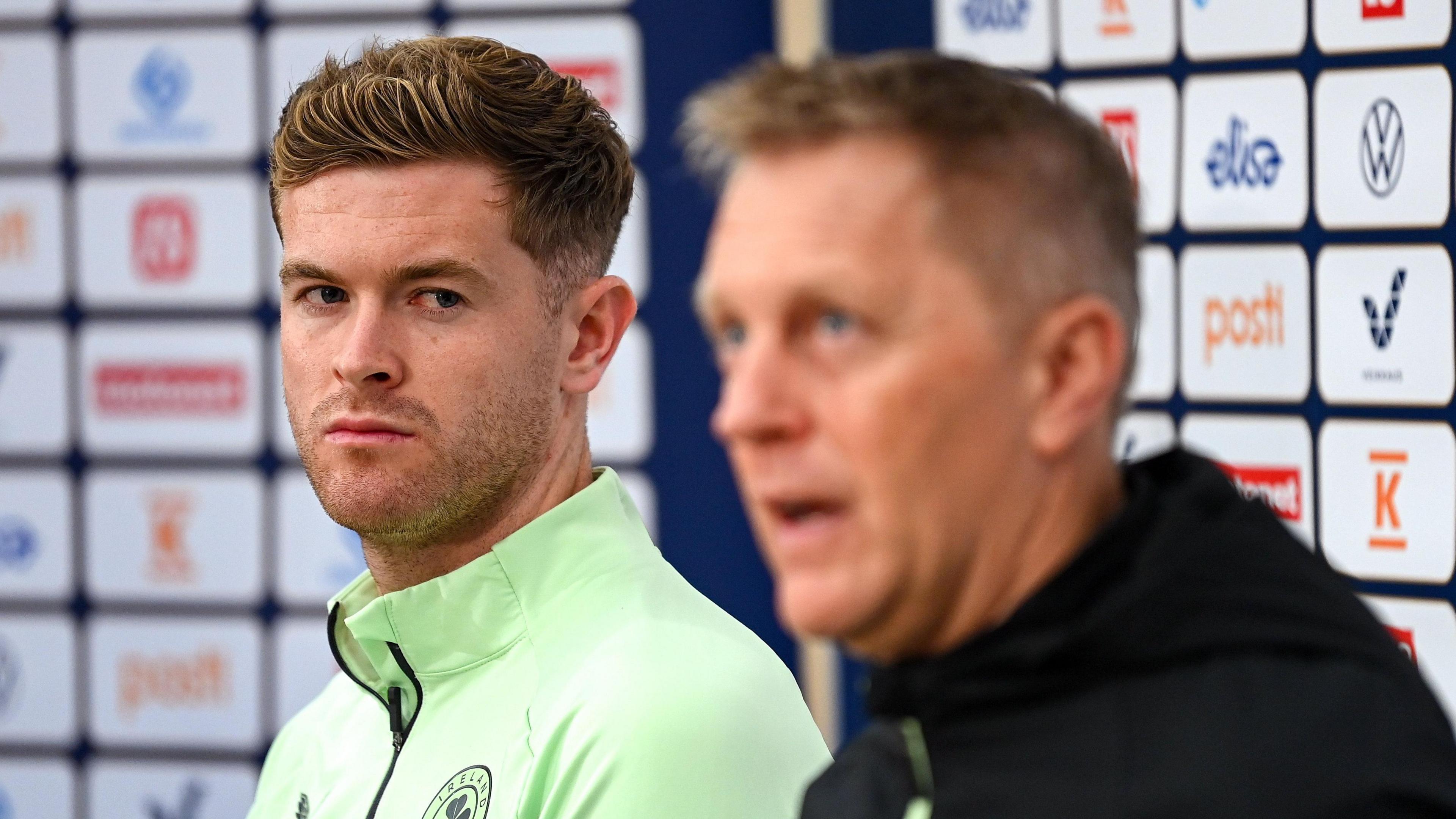 Collins next to Hallgrimsson during Wednesday's news conference