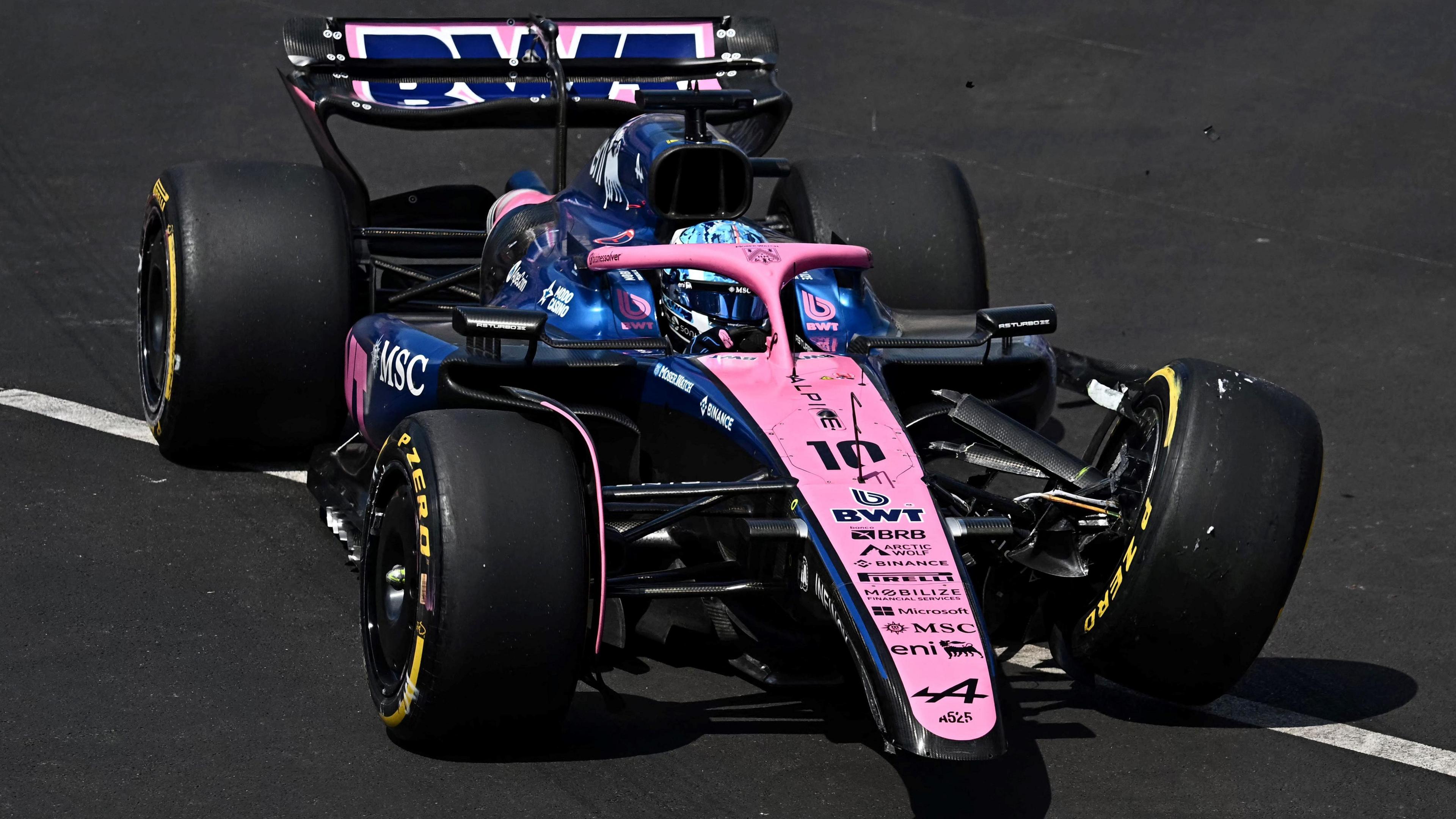 Pierre Gasly's Alpine with a broken front wing and a damaged front left tyre