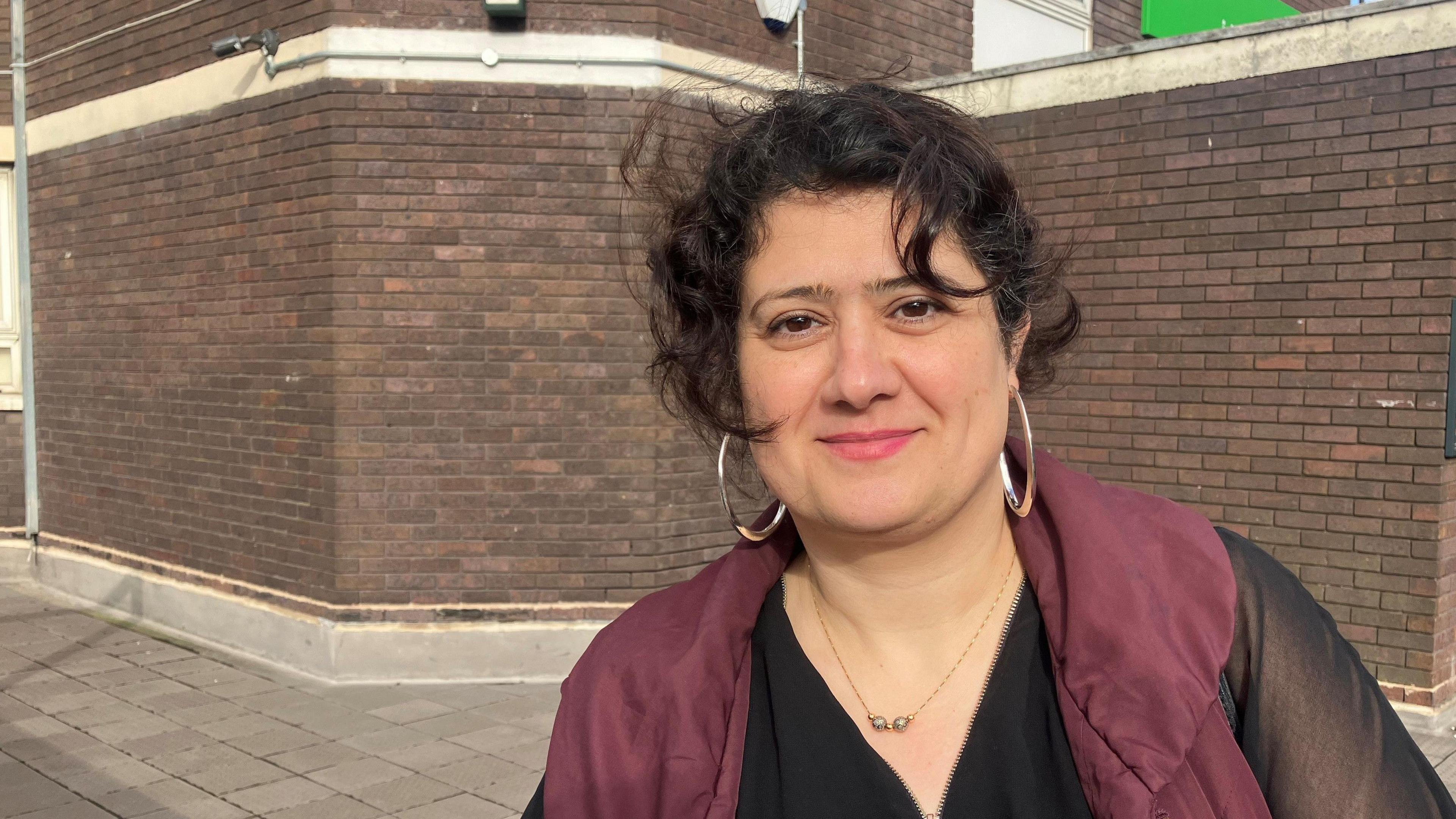 Photo of Zahra Khanzadh, outside the JobCentre Plus in Stockport