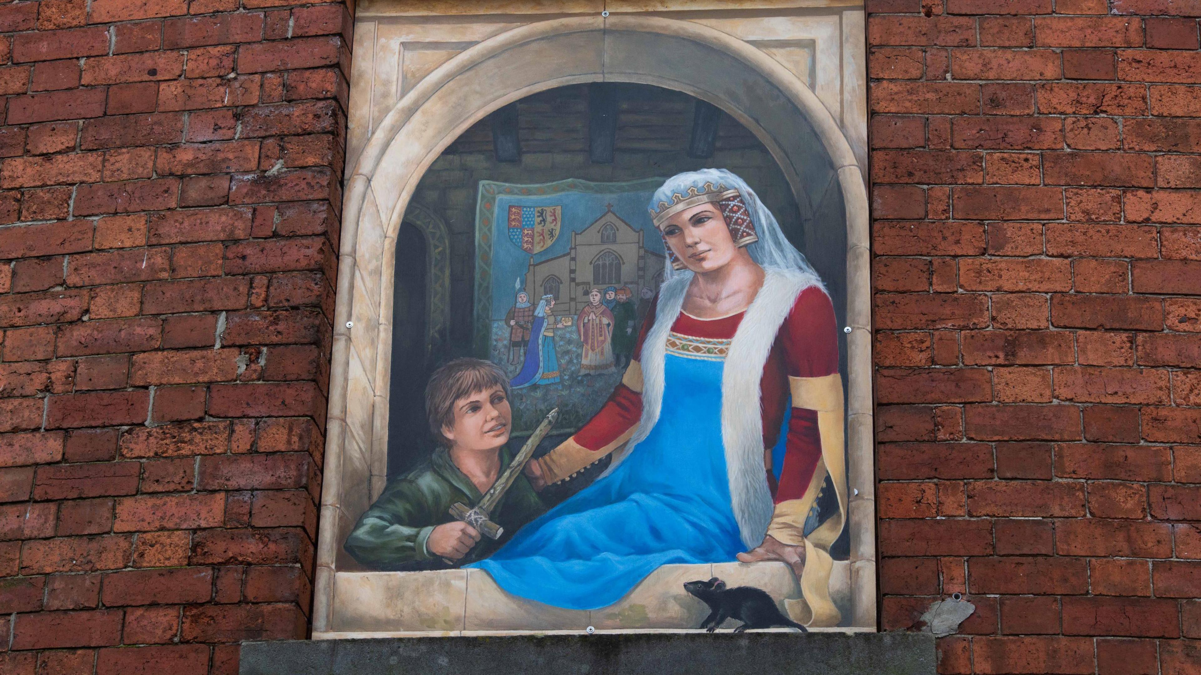 A window painting depicting Queen Philippa and a young boy with a sword.