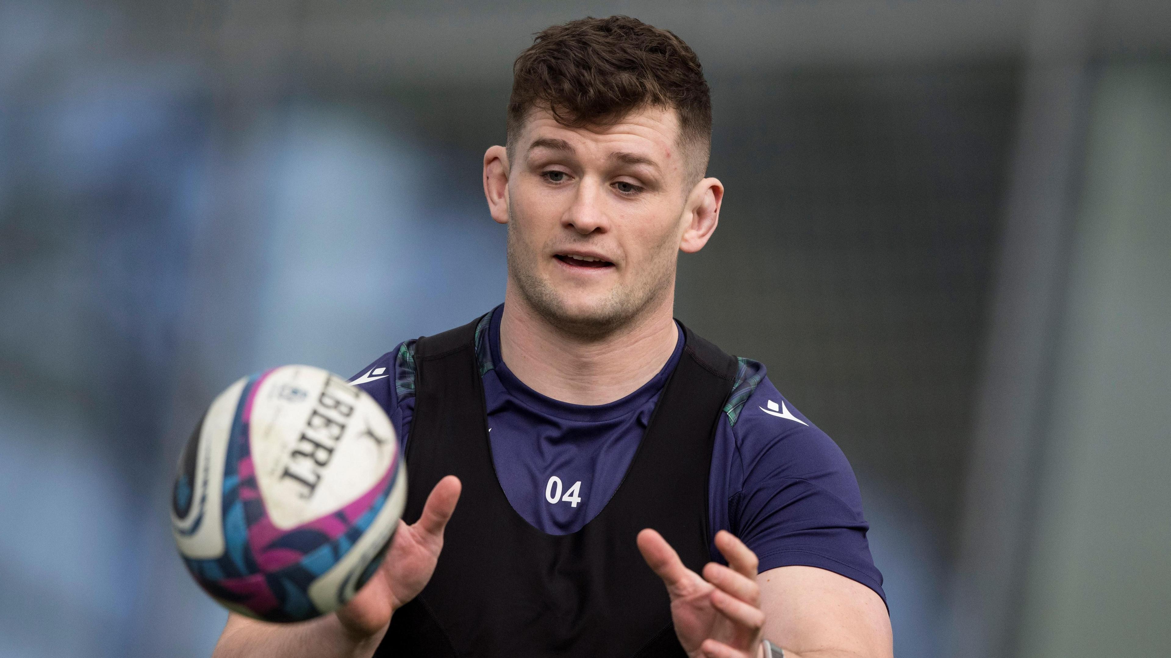 Magnus Bradbury catches a rugby ball