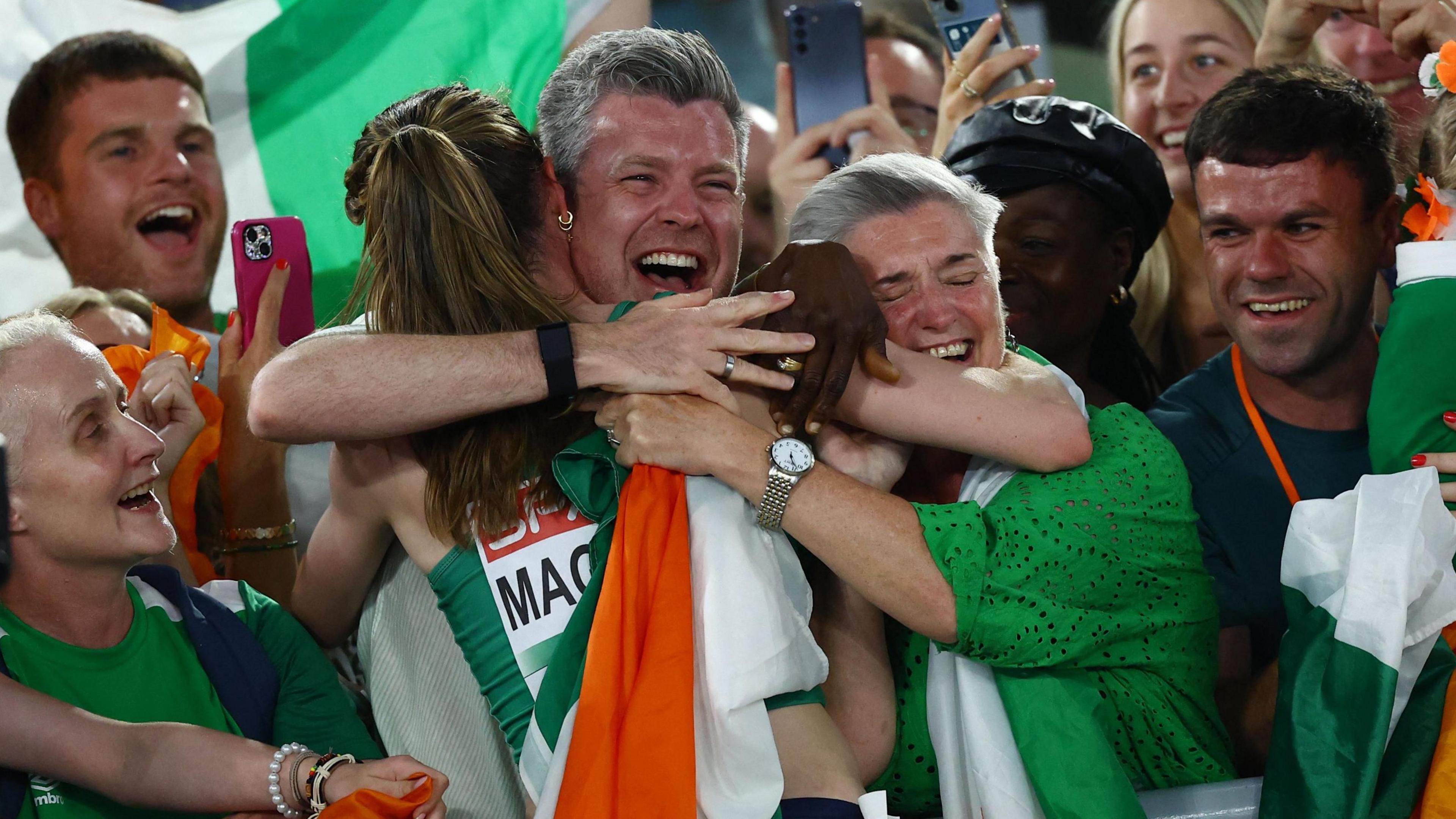 Mageean is congratulated by her supporters in Rome after her victory