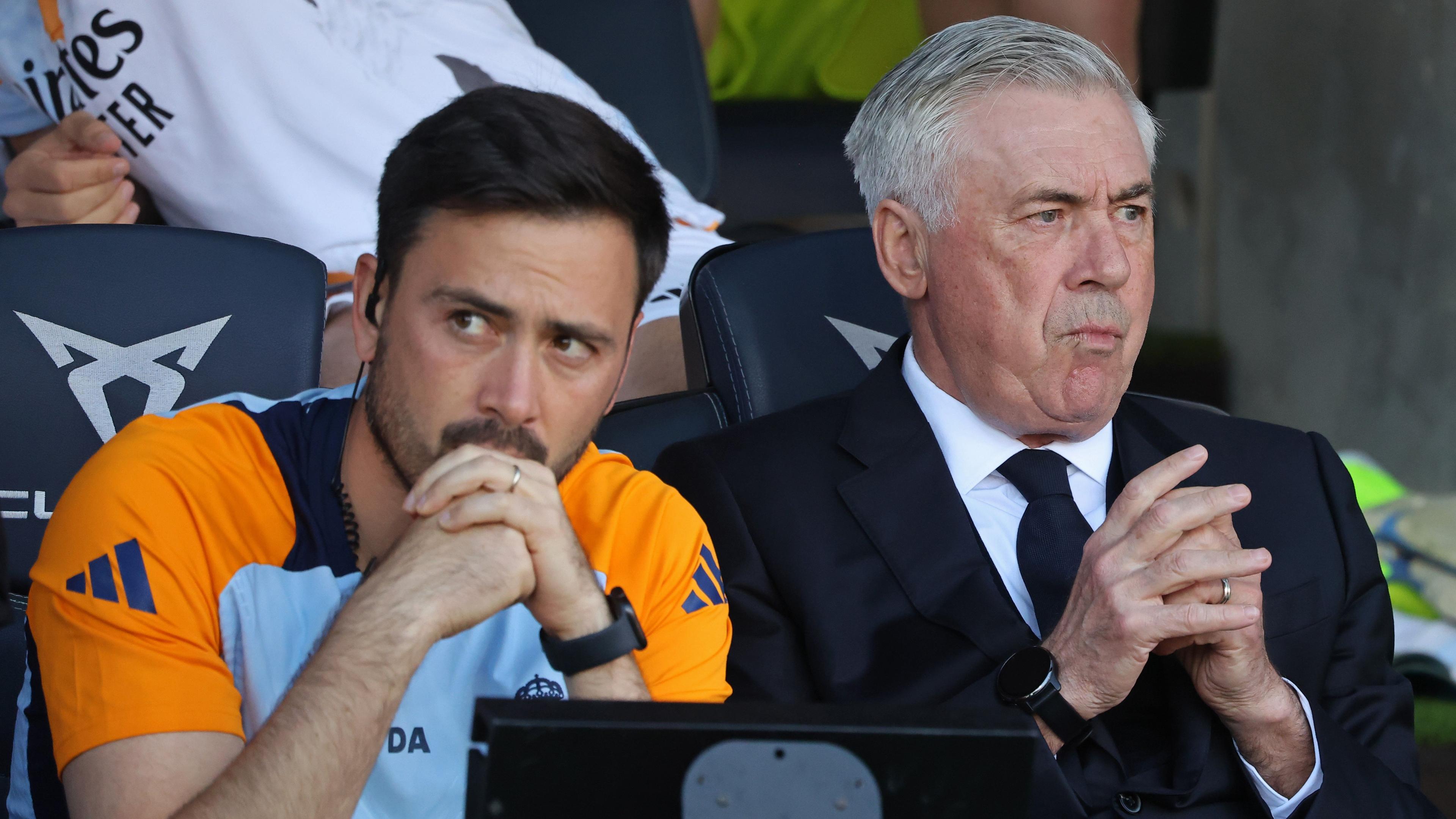 Davide Ancelotti in the stands with his father, Carlo