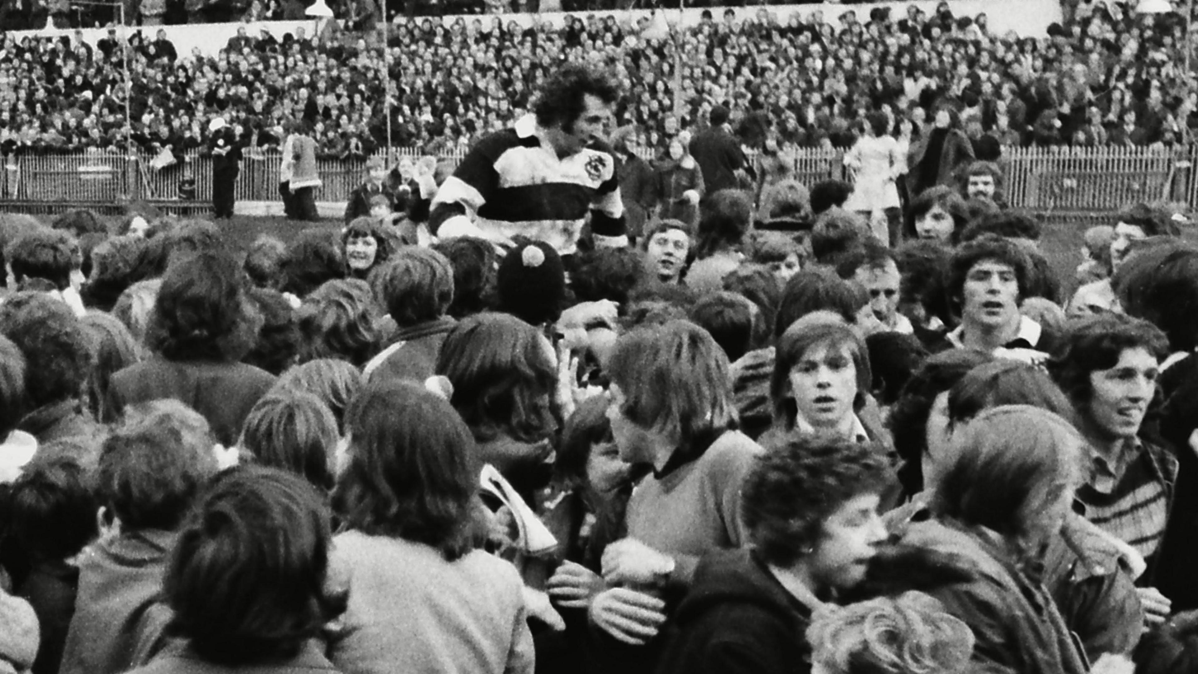 Gareth Edwards is carried off the pitch after Barbarians' win against New Zealand in Cardiff in 1973