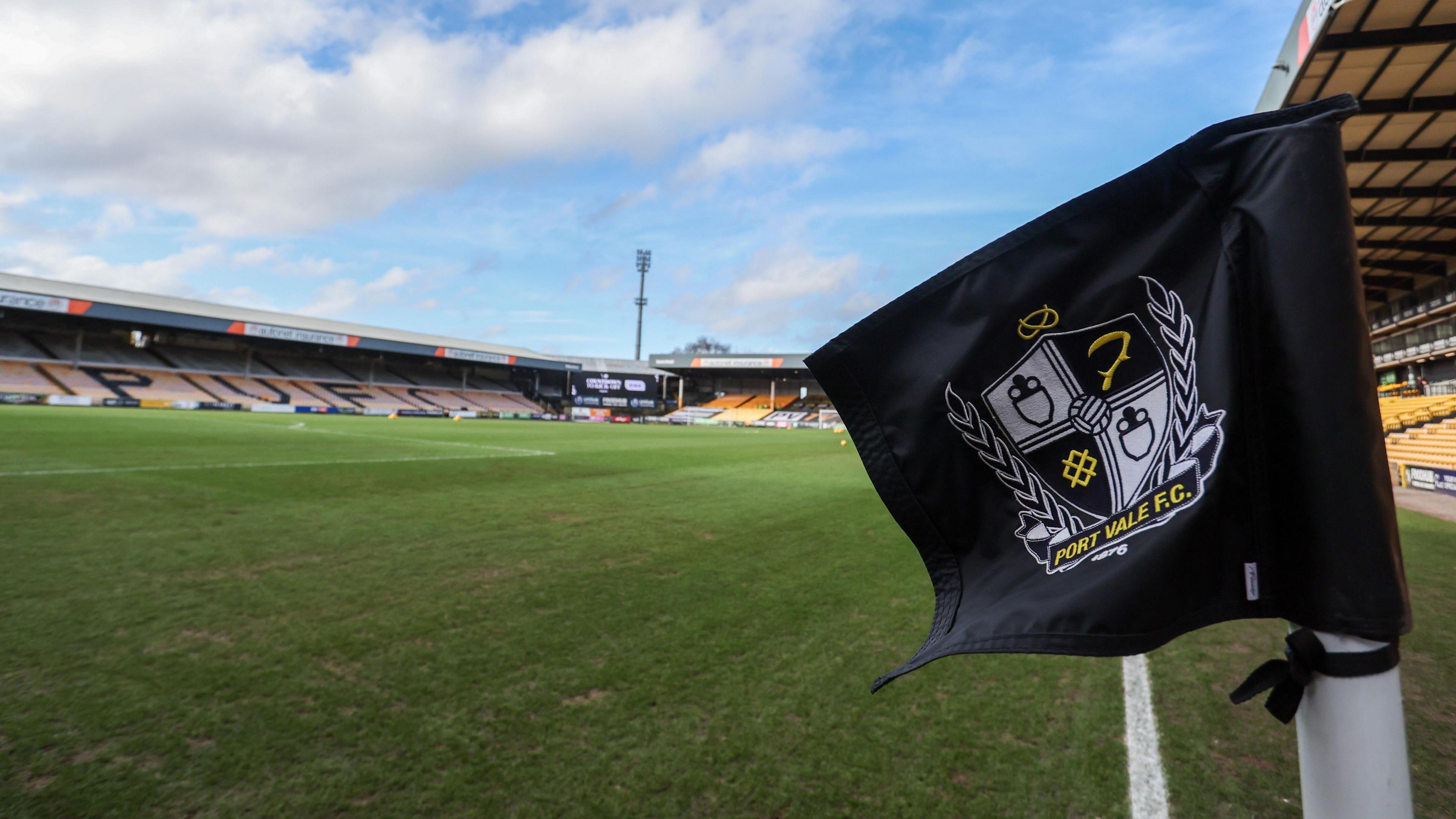 A general view across the pitch at Vale Park with the black corner flag showing the Port Vale badge in the foreground.