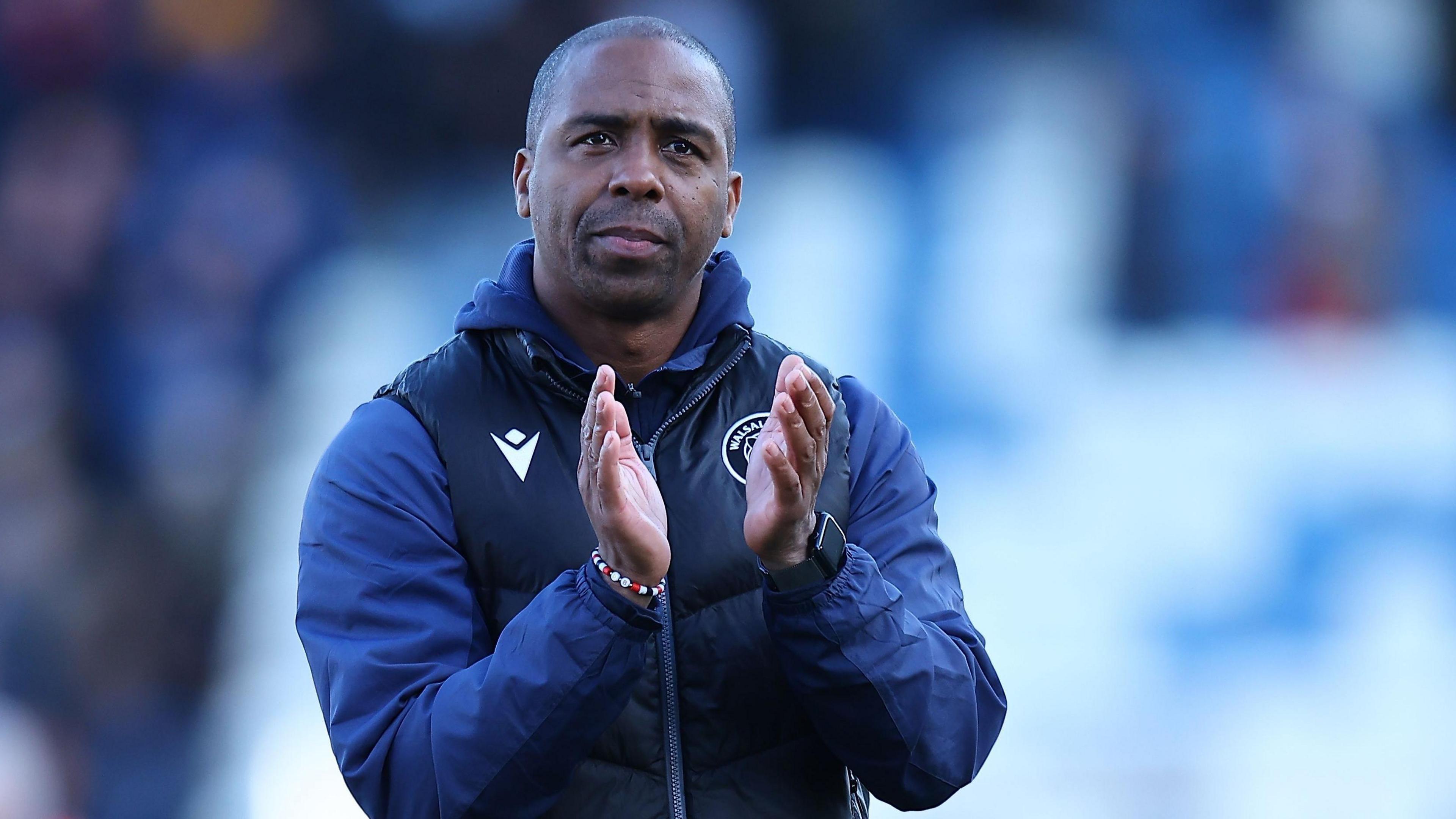 Walsall interim boss Darren Byfield applauds supporters