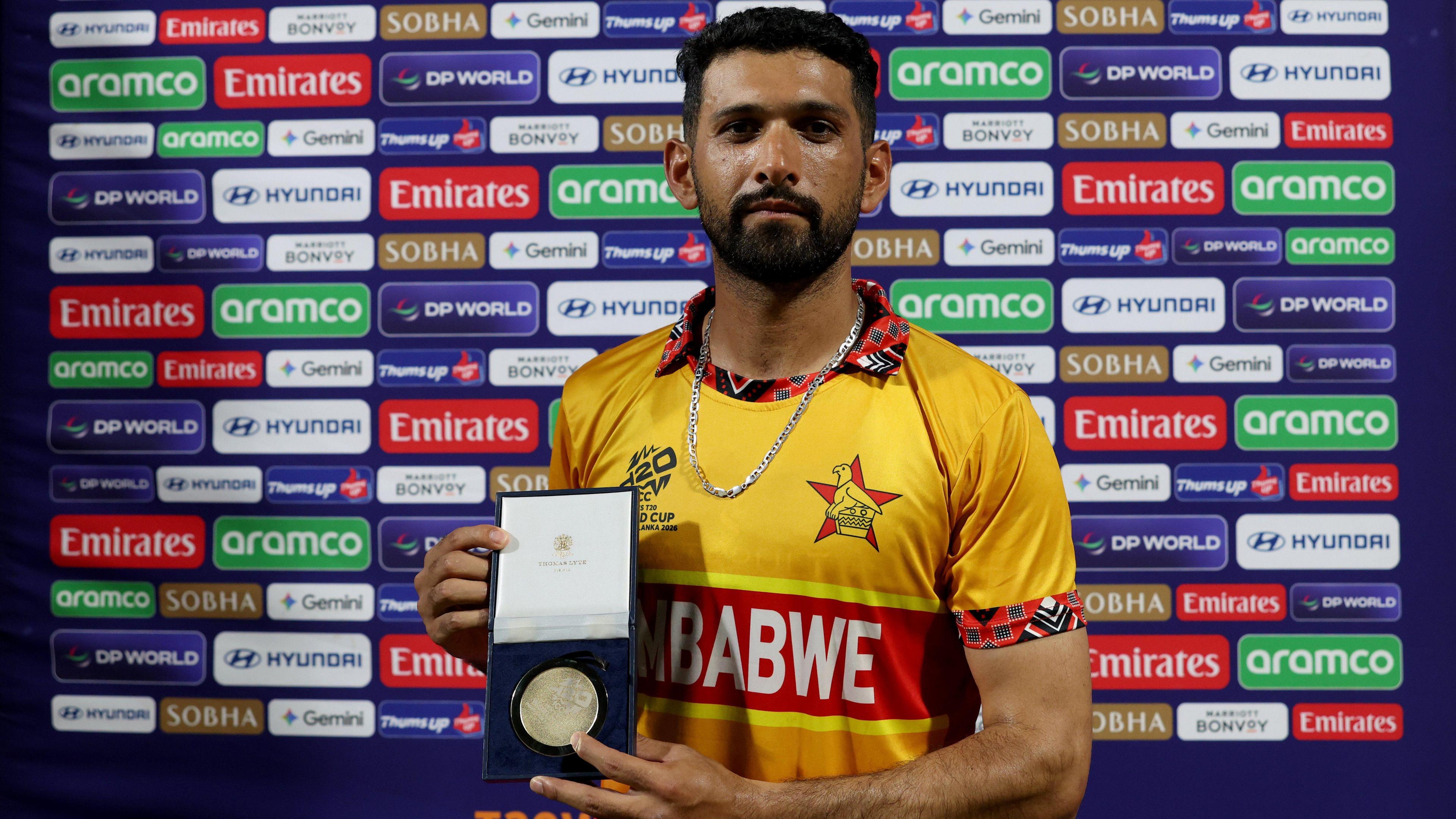 Zimbabwe captain Sikandar Raza poses with the player of the match medal after victory over Sri Lanka