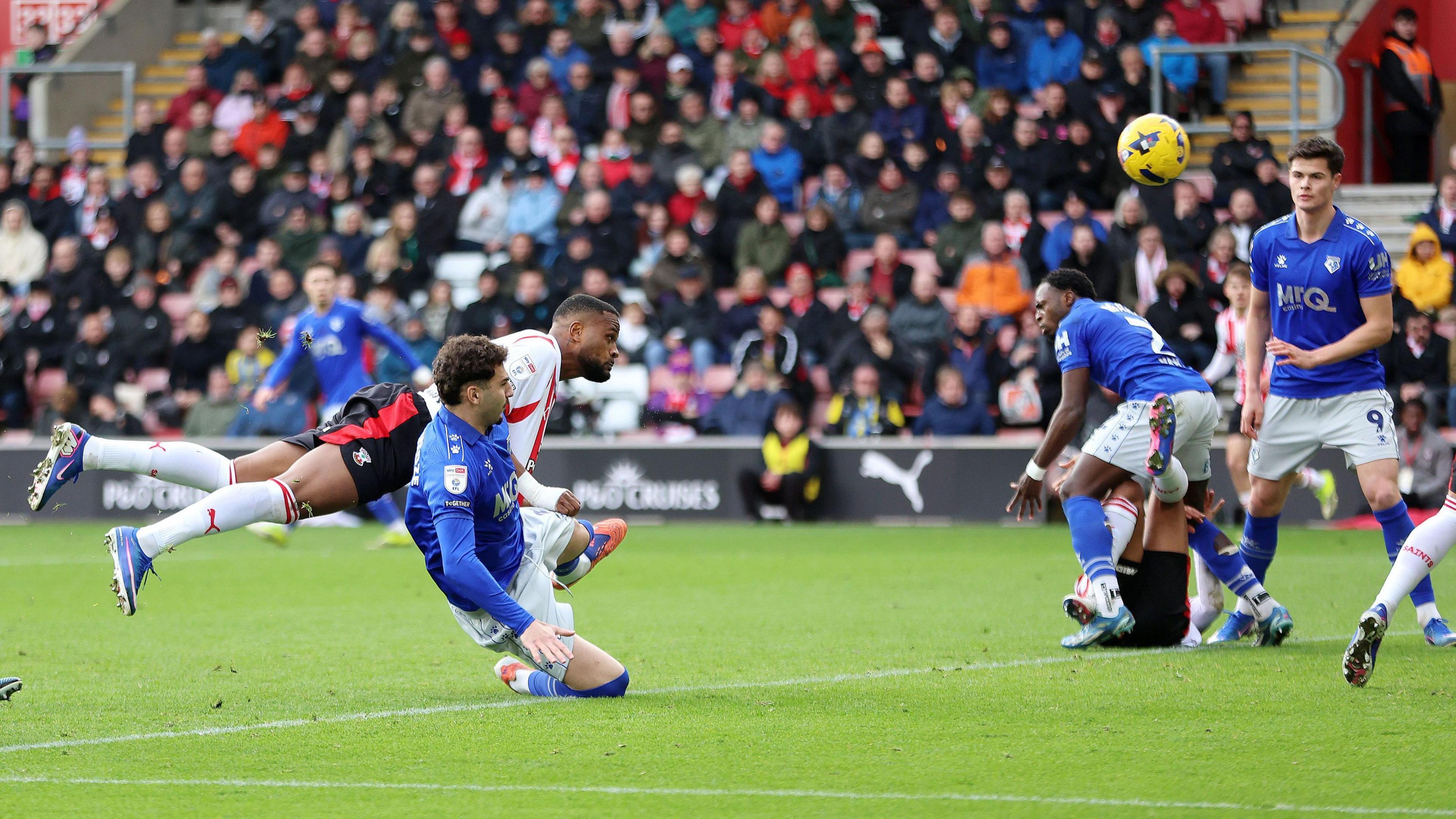 Cyle Larin gets ahead of his marker to execute a diving header and score against Watford