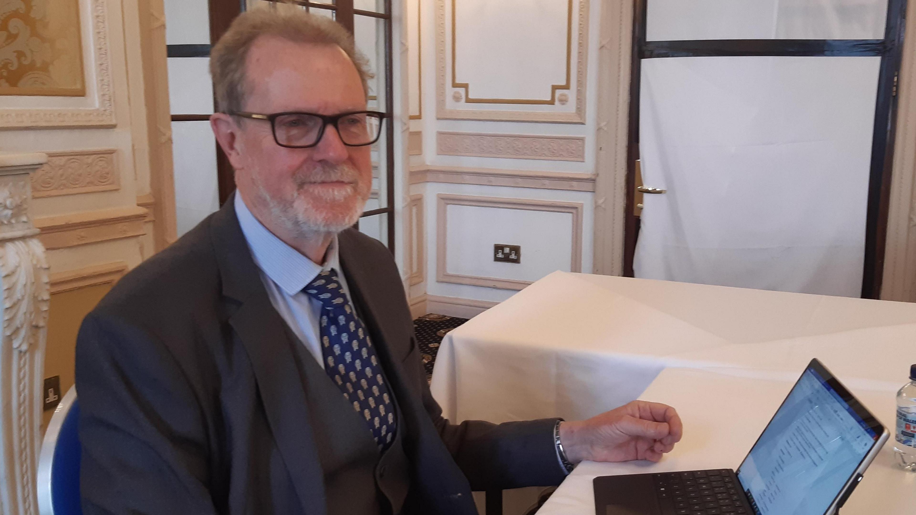 Planning inspector Phillip Ware with his laptop at the public inquiry in the Imperial Hotel, Blackpool.