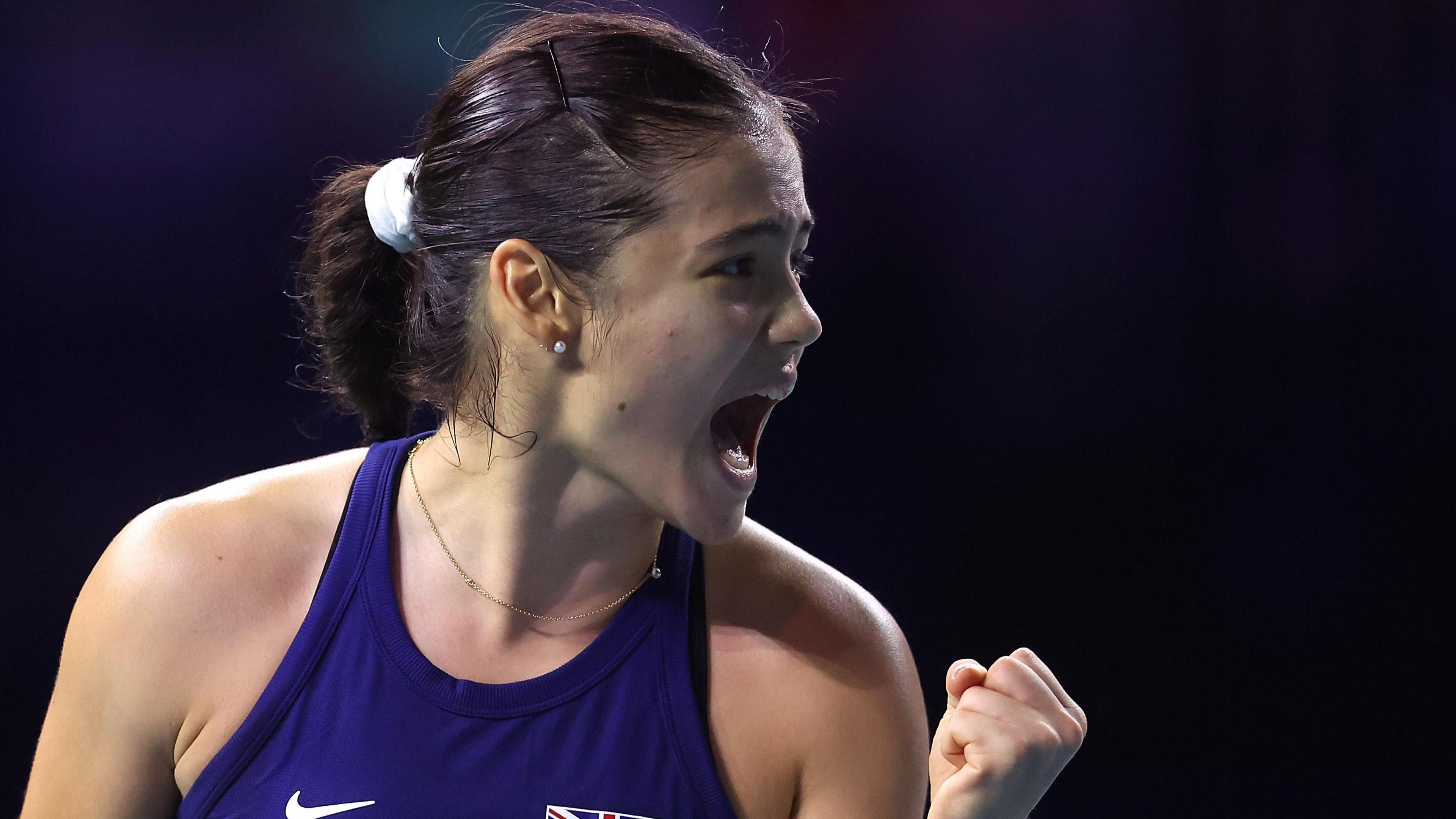 Great Britain's Emma Raducanu celebrates winning a point during her Billie Jean King Cup match against Germany's Jule Niemeier