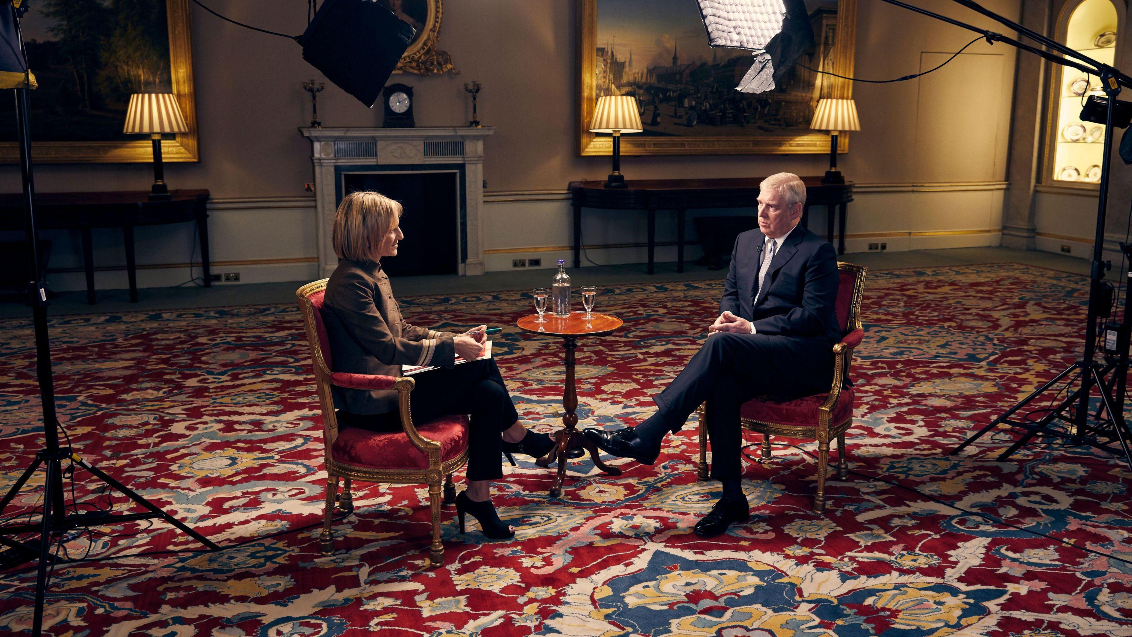 Prince Andrew sits in a chair opposite Emily Maitlis