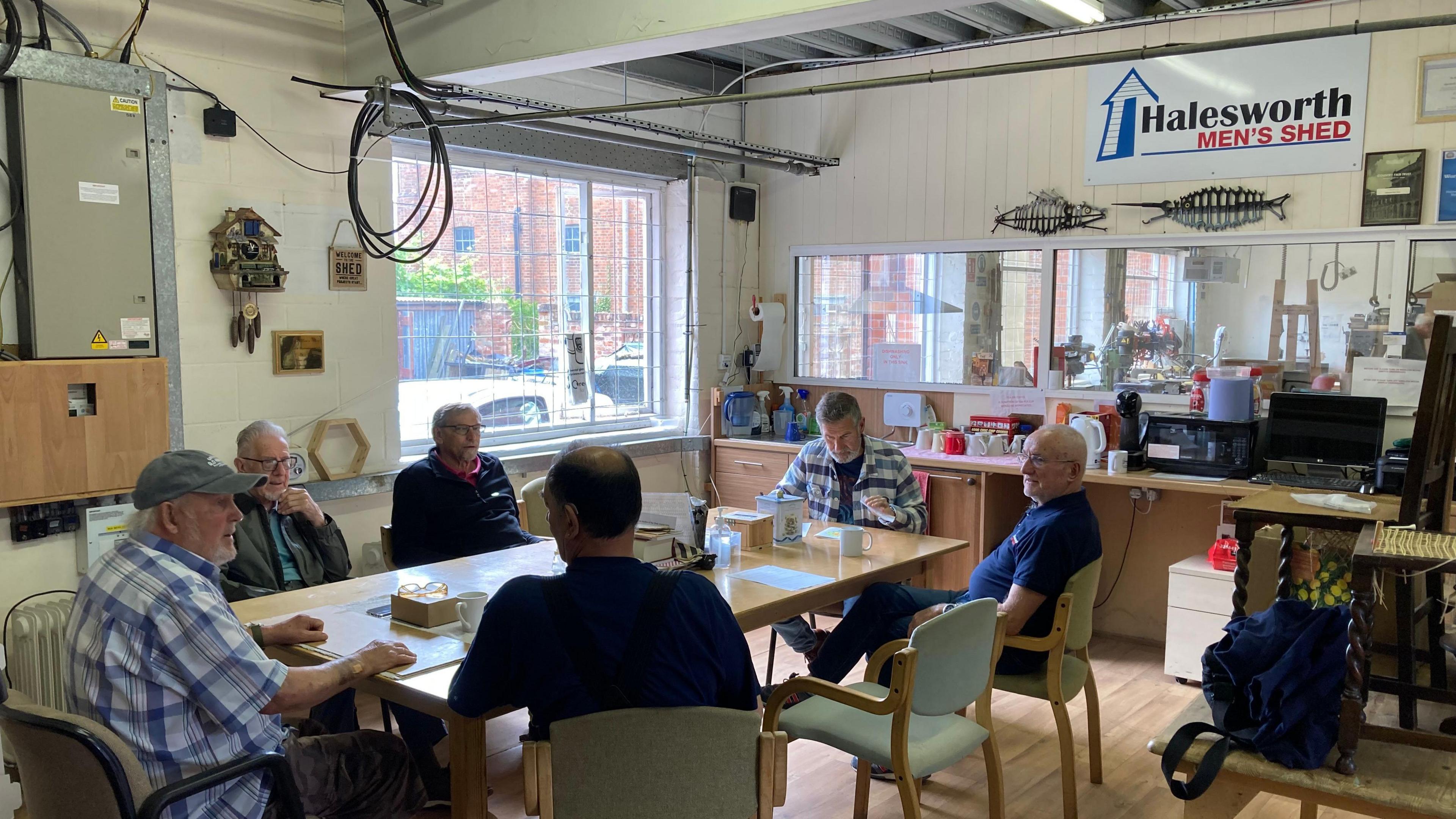 A group of men in the Halesworth's Men's Shed