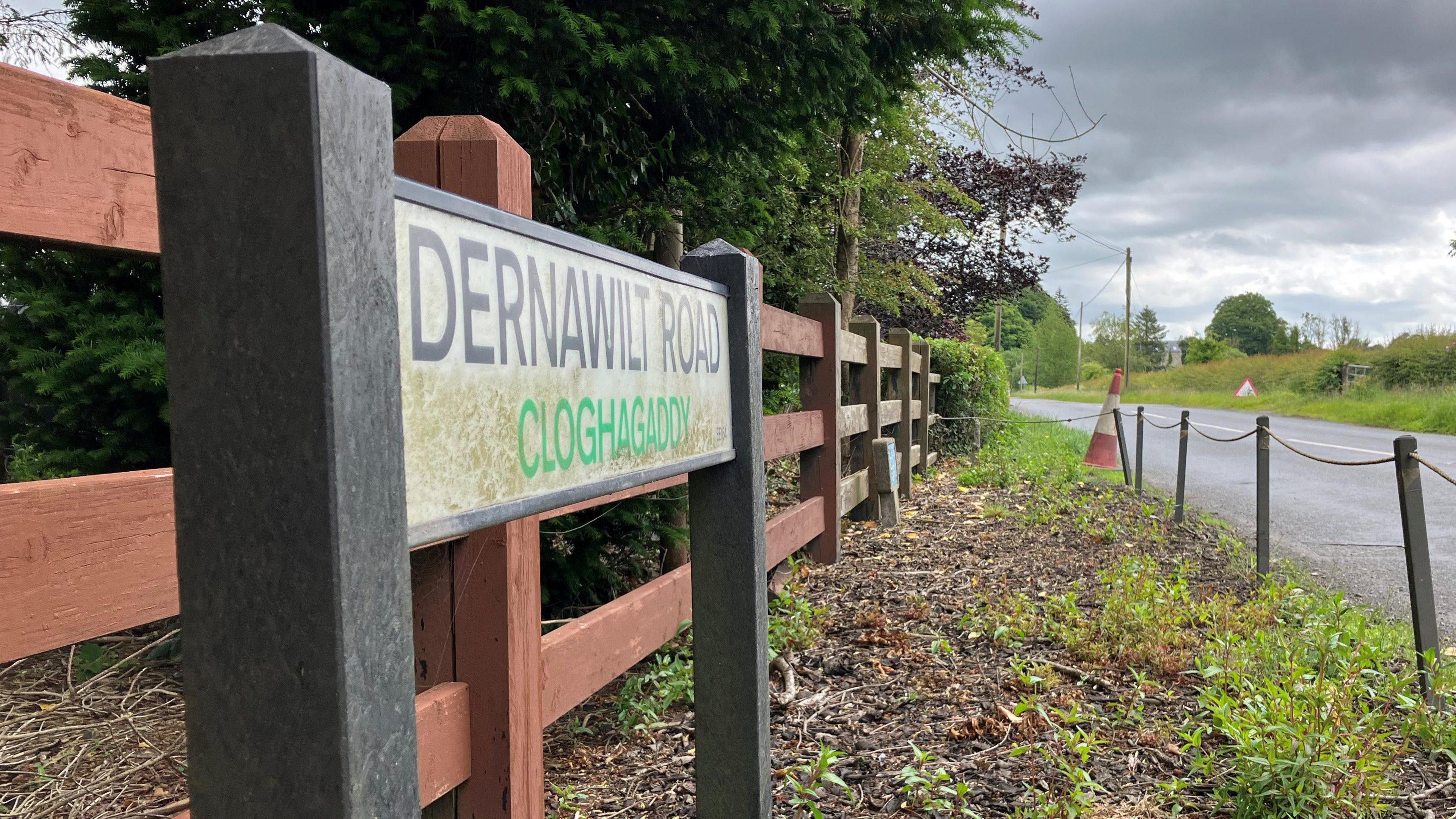 Dernawilt Road sign with cone in the background