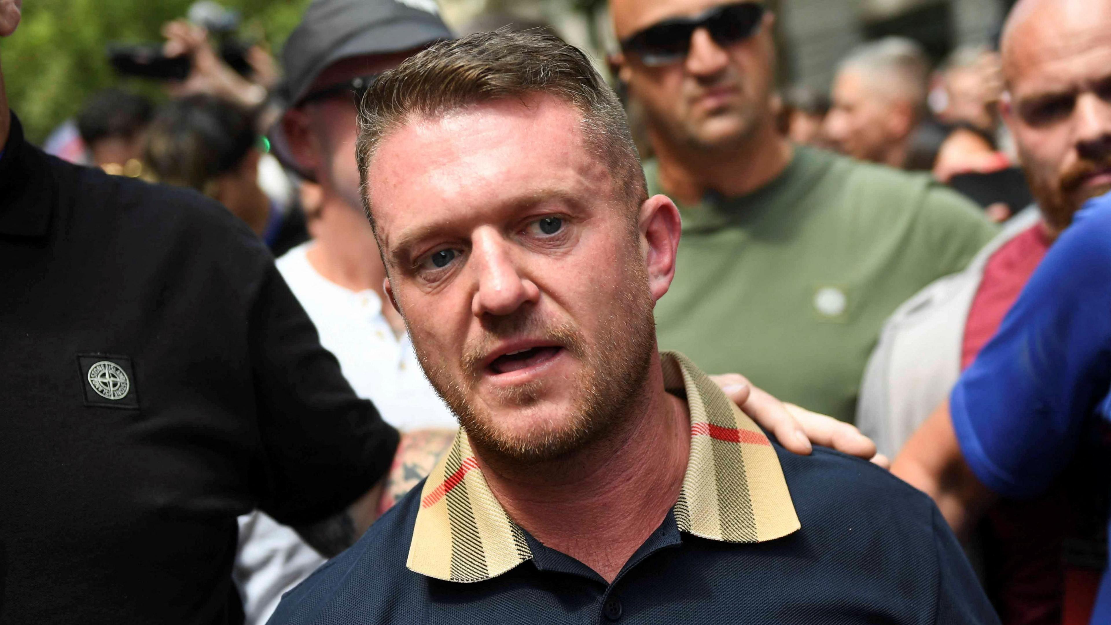 Stephen Yaxley-Lennon aka Tommy Robinson, wearing a polo shirt with a Burberry check on the collar, at a protest on his behalf last week