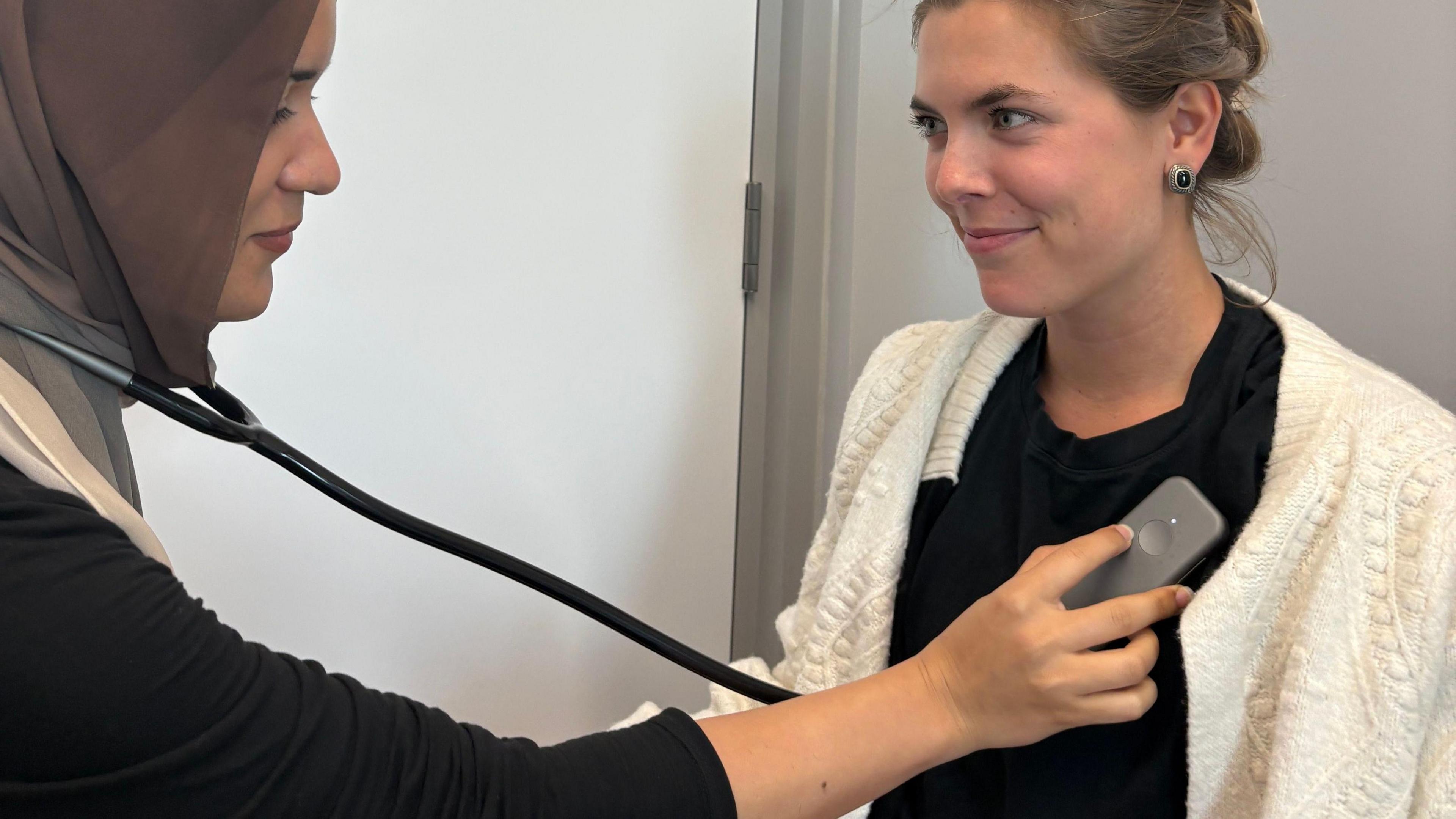 Undated handout photo issued by Imperial College London of an AI-powered stethoscope in use.