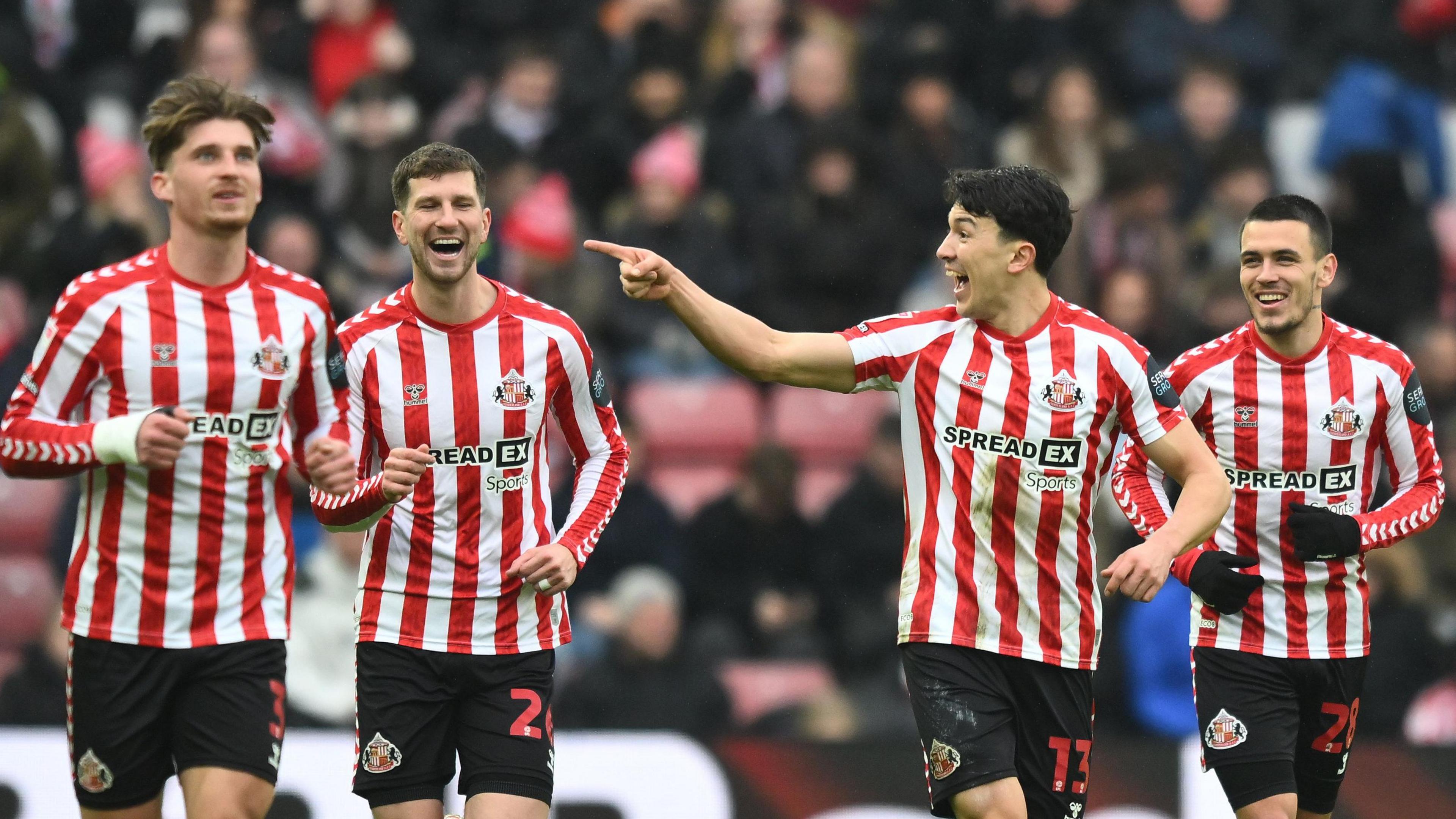 Sunderland players after Dennis Cirkin (far left) scores their second goal against Watford 