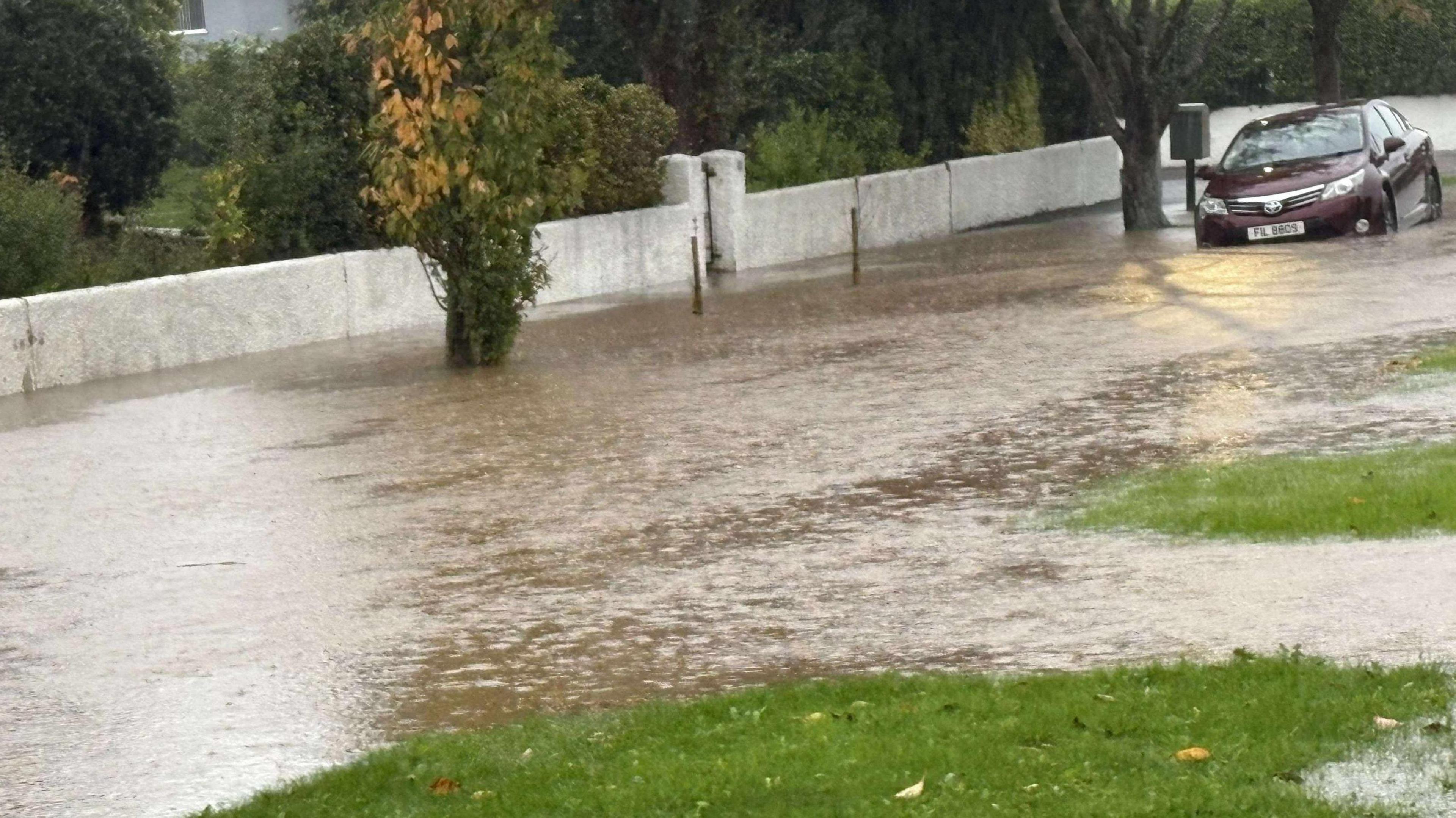 Flooding Slievecorragh Avenue, Newcastle, County Down.