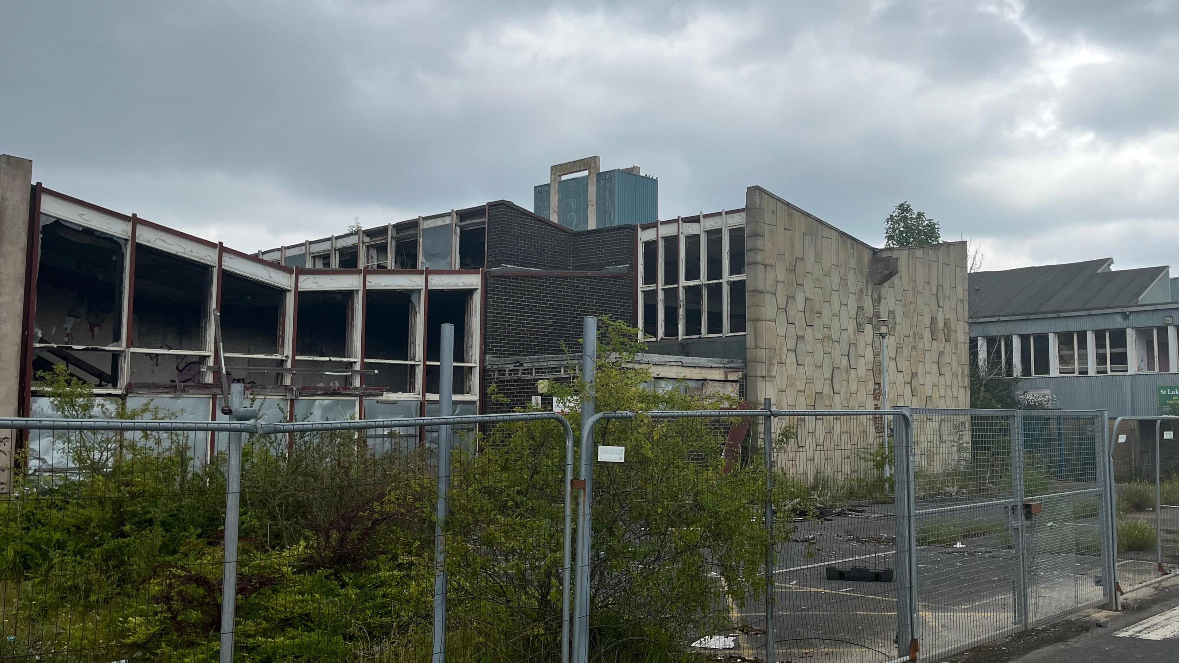 Abondoned school behind gate