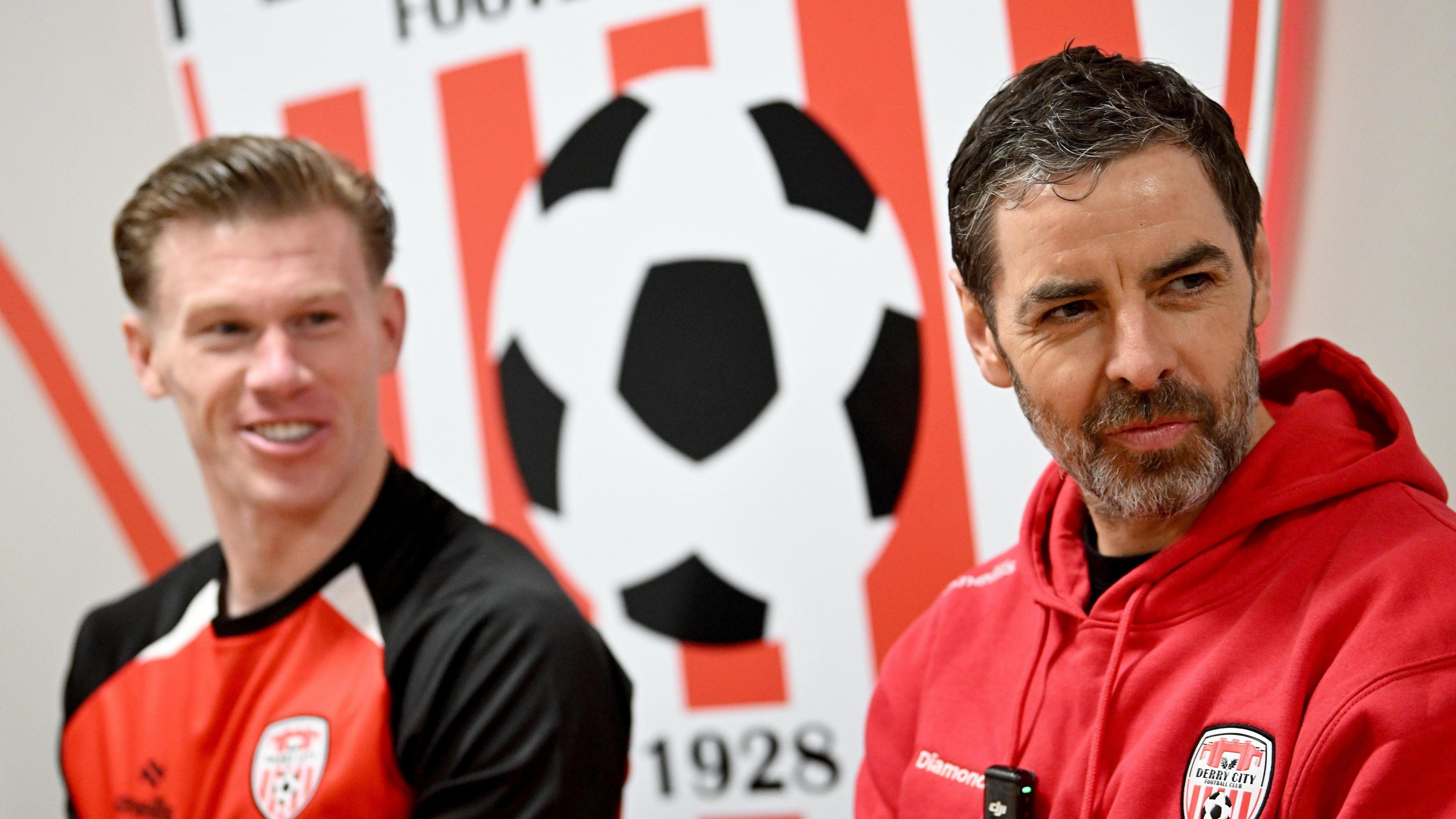 James McClean sits next to Tiernan Lynch at a press conference