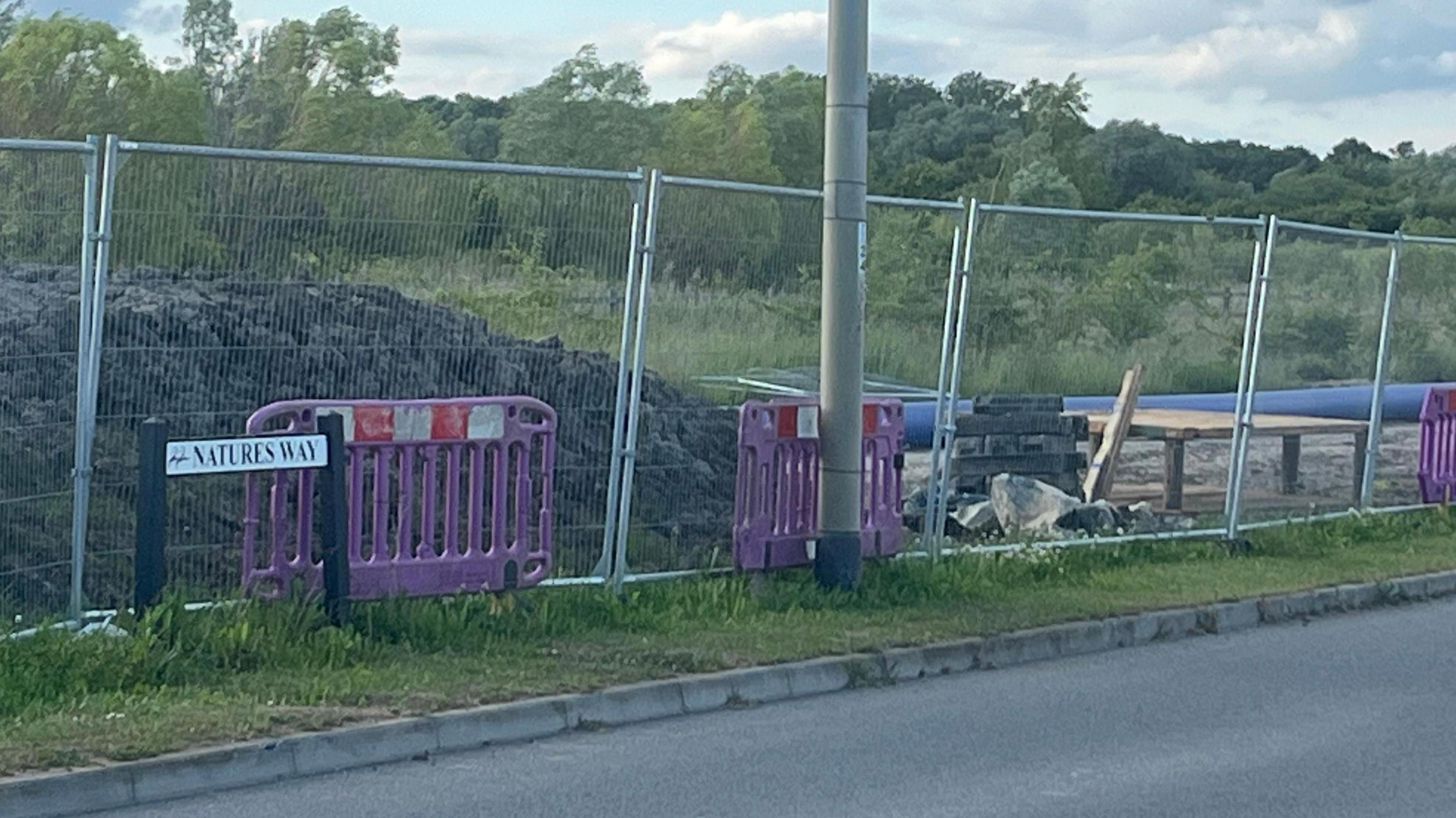 A fence alongside Nature's Way