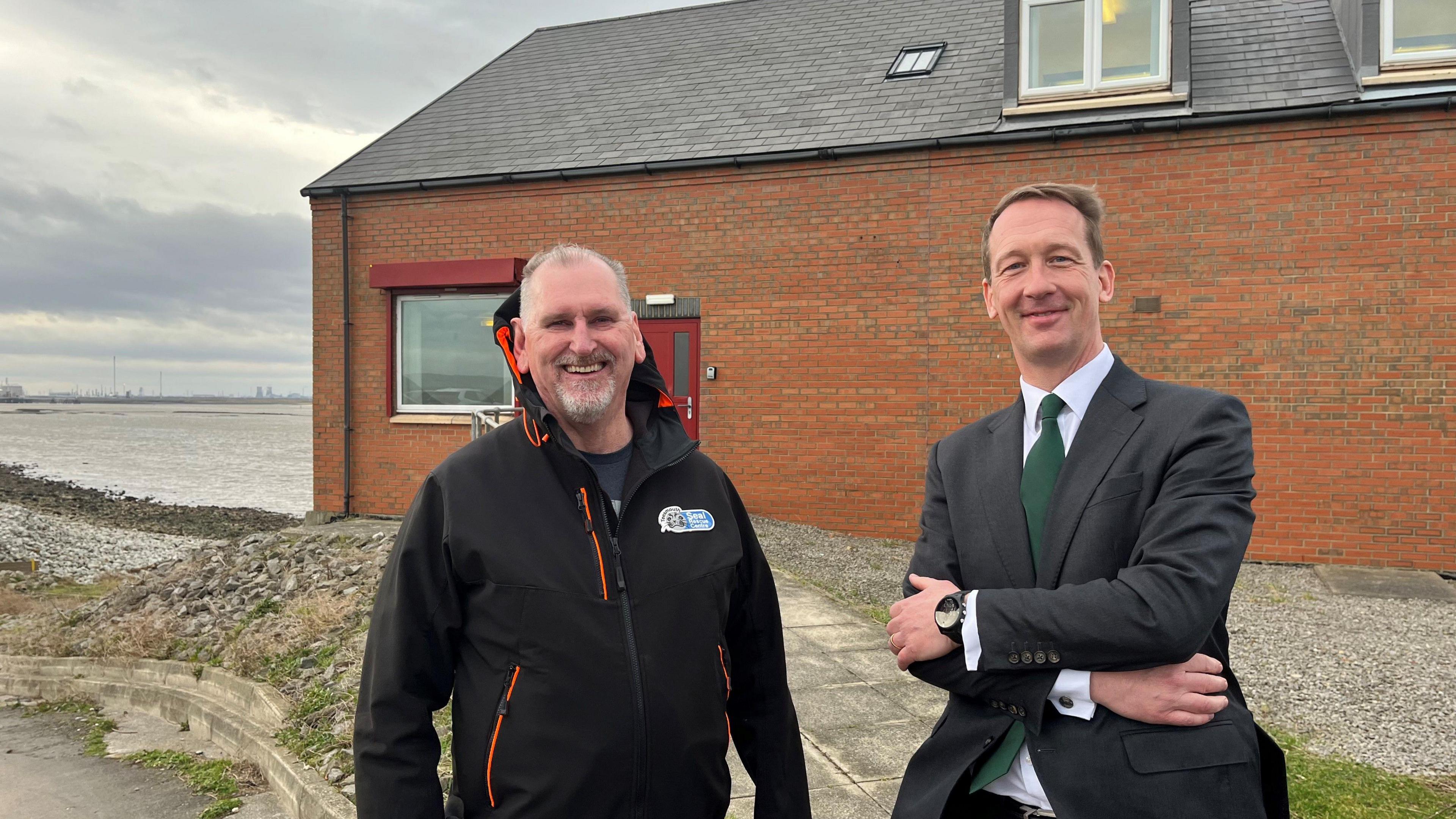 David Newell, chair of the Teesmouth Seal Conservation Trust, with PD Ports chief executive officer Frans Calje in front of the new seal hospital site