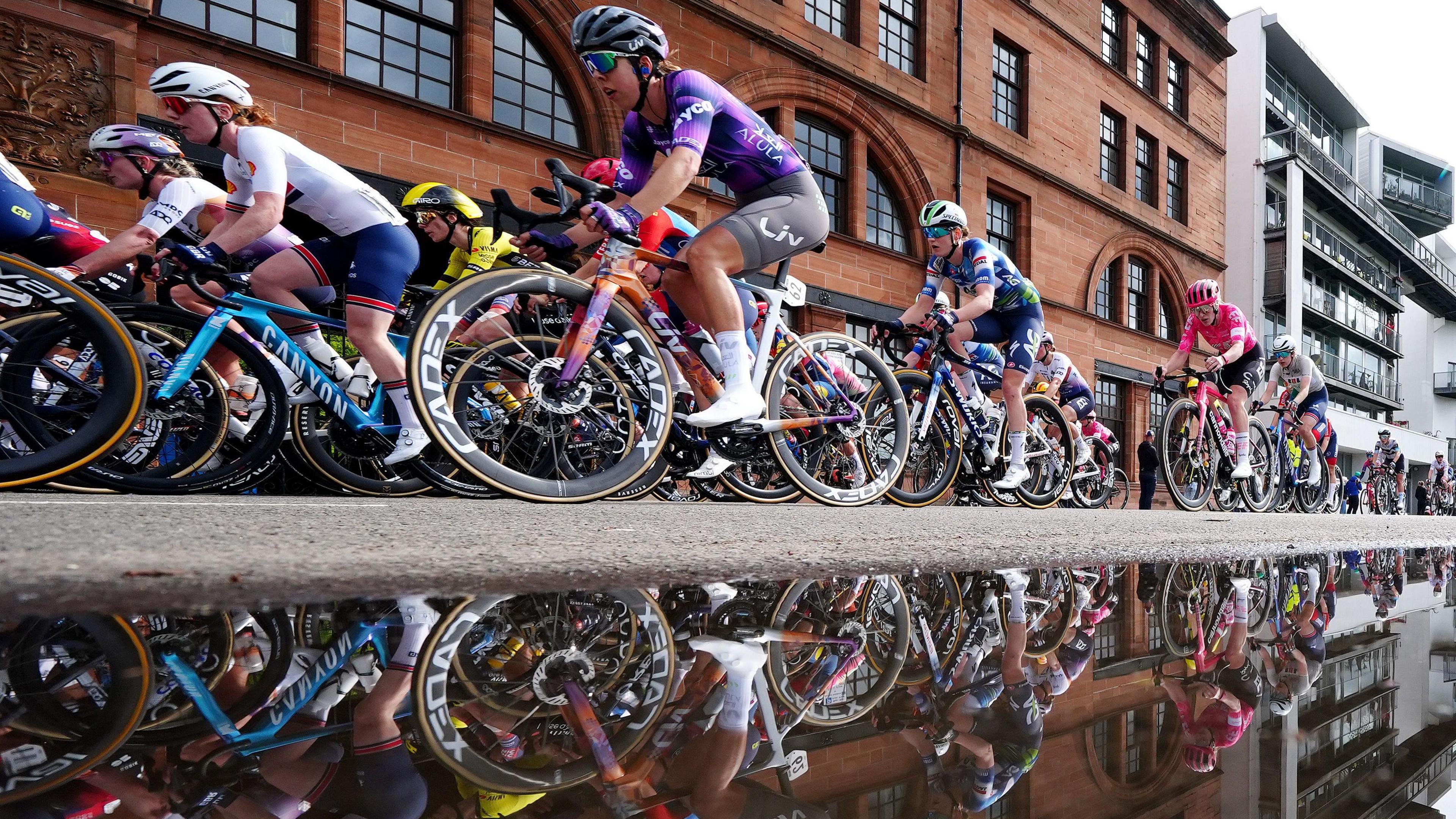 Riders at the rolling start in Glasgow's East End during stage four of the 2025 Lloyds Tour of Britain Women in Glasgow.