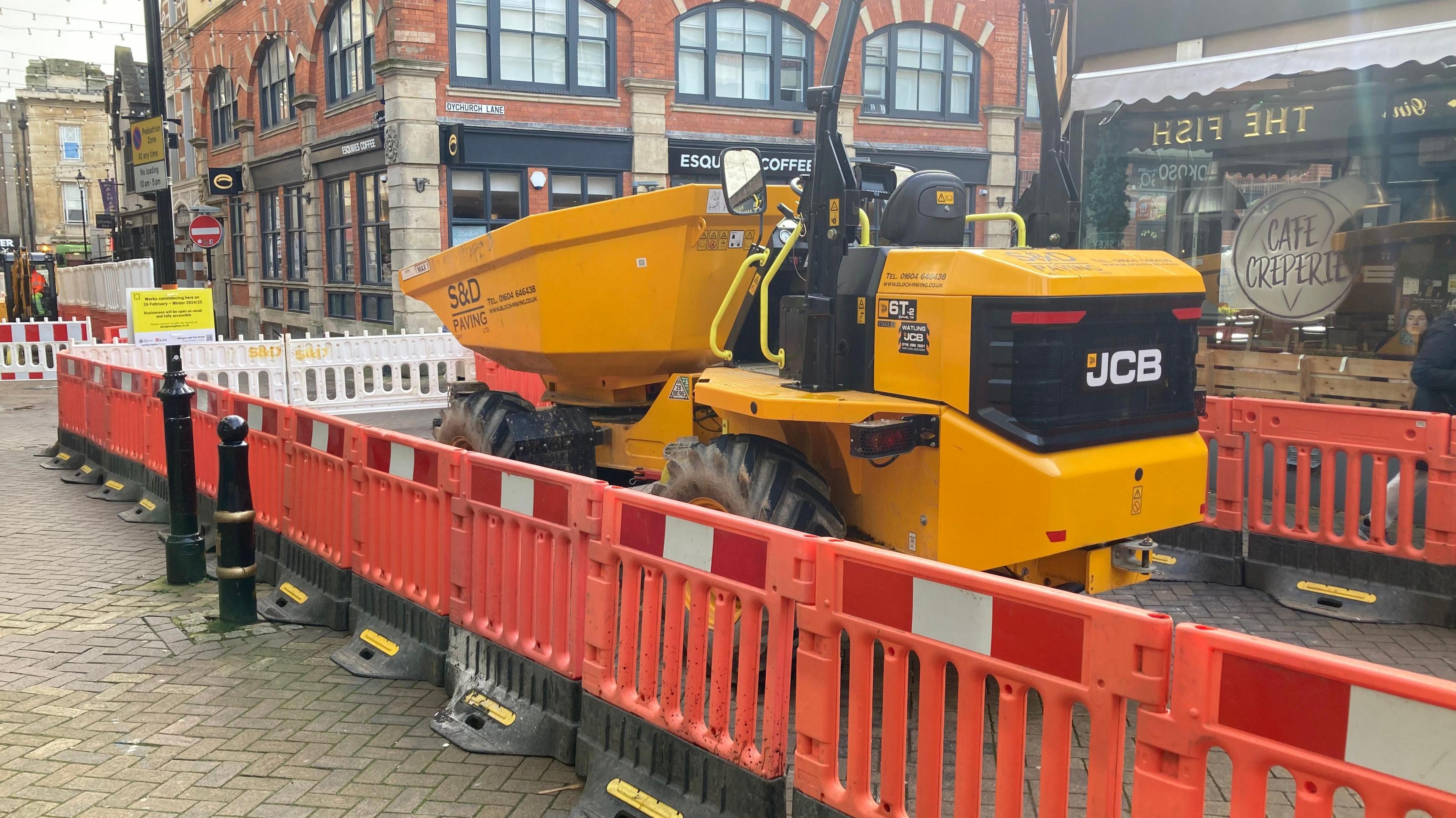 A digger on Fish Street 