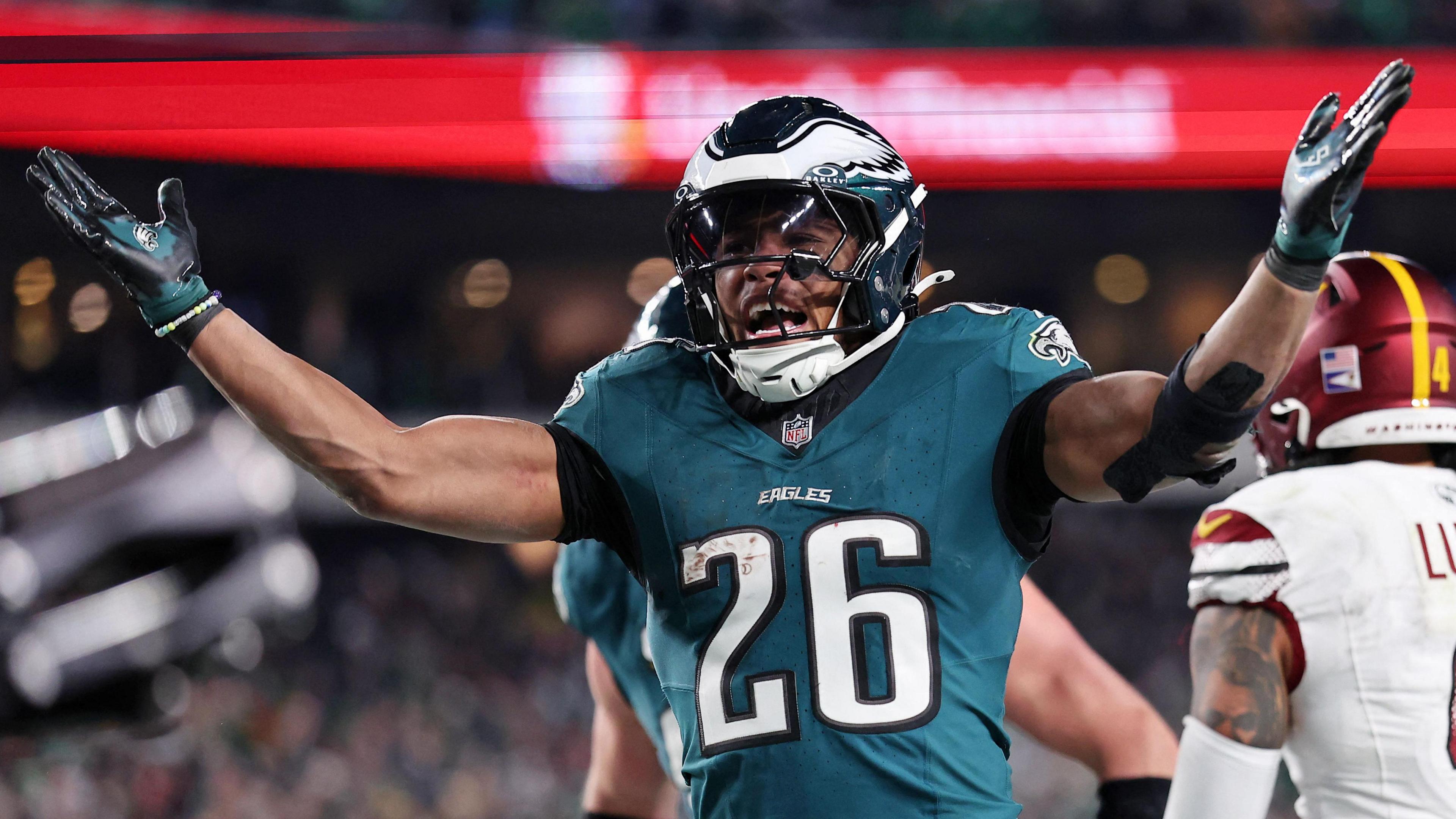 Saquon Barkley celebrates for the Philadelphia Eagles against the Washington Commanders