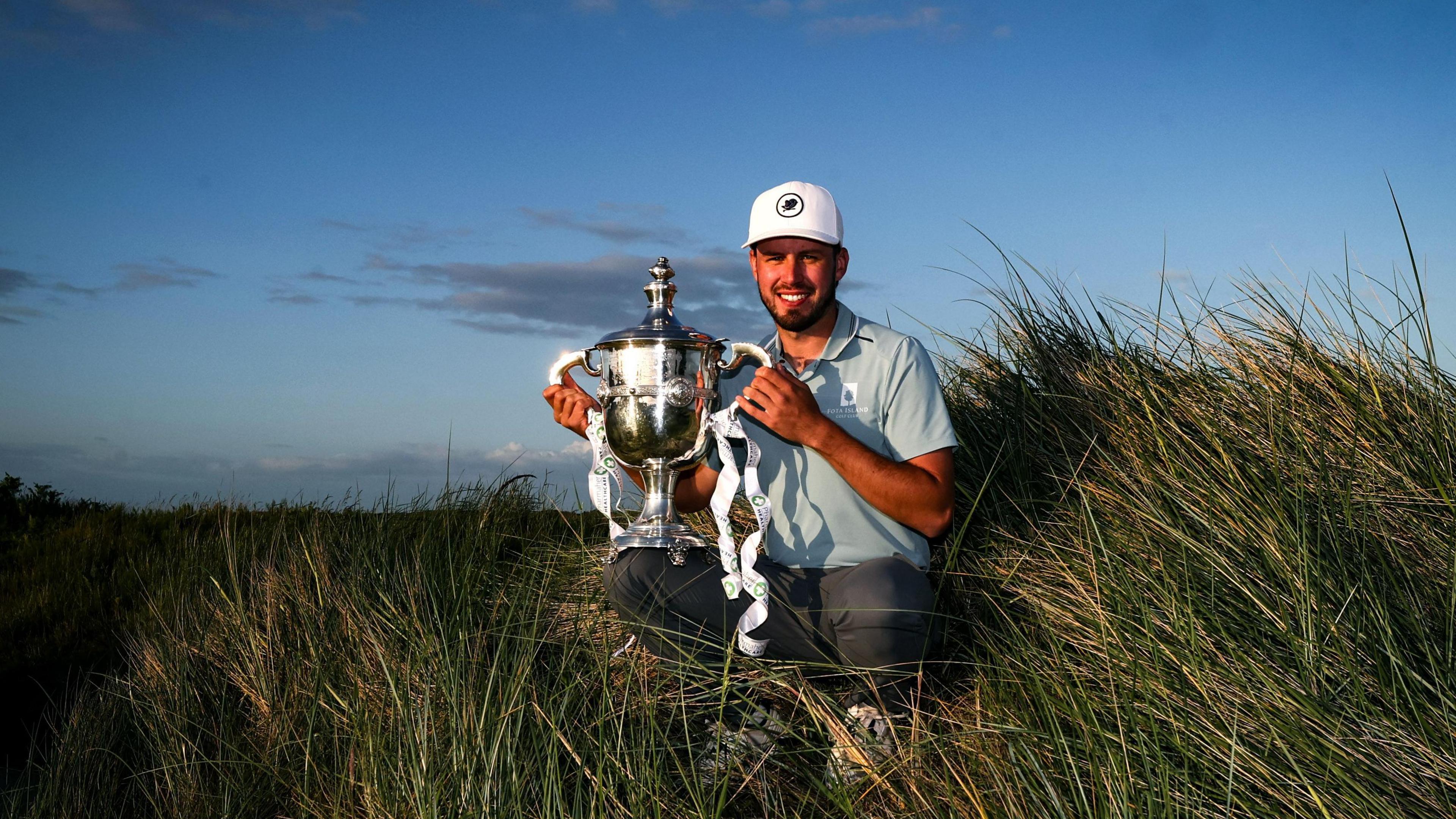David Howard poses with the 2025 East of Ireland trophy 