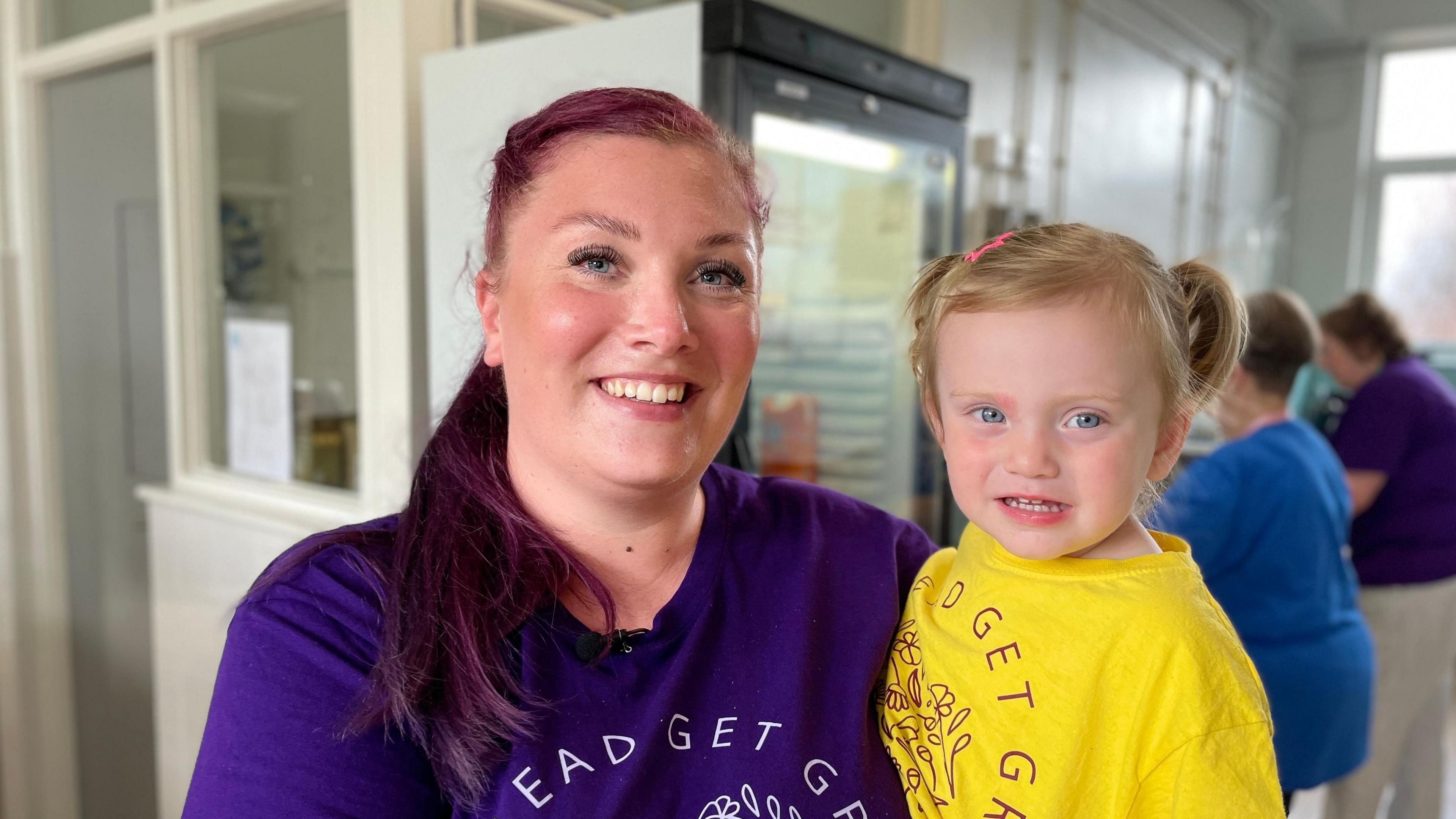 Volunteers Chantelle and her daughter Phoebe