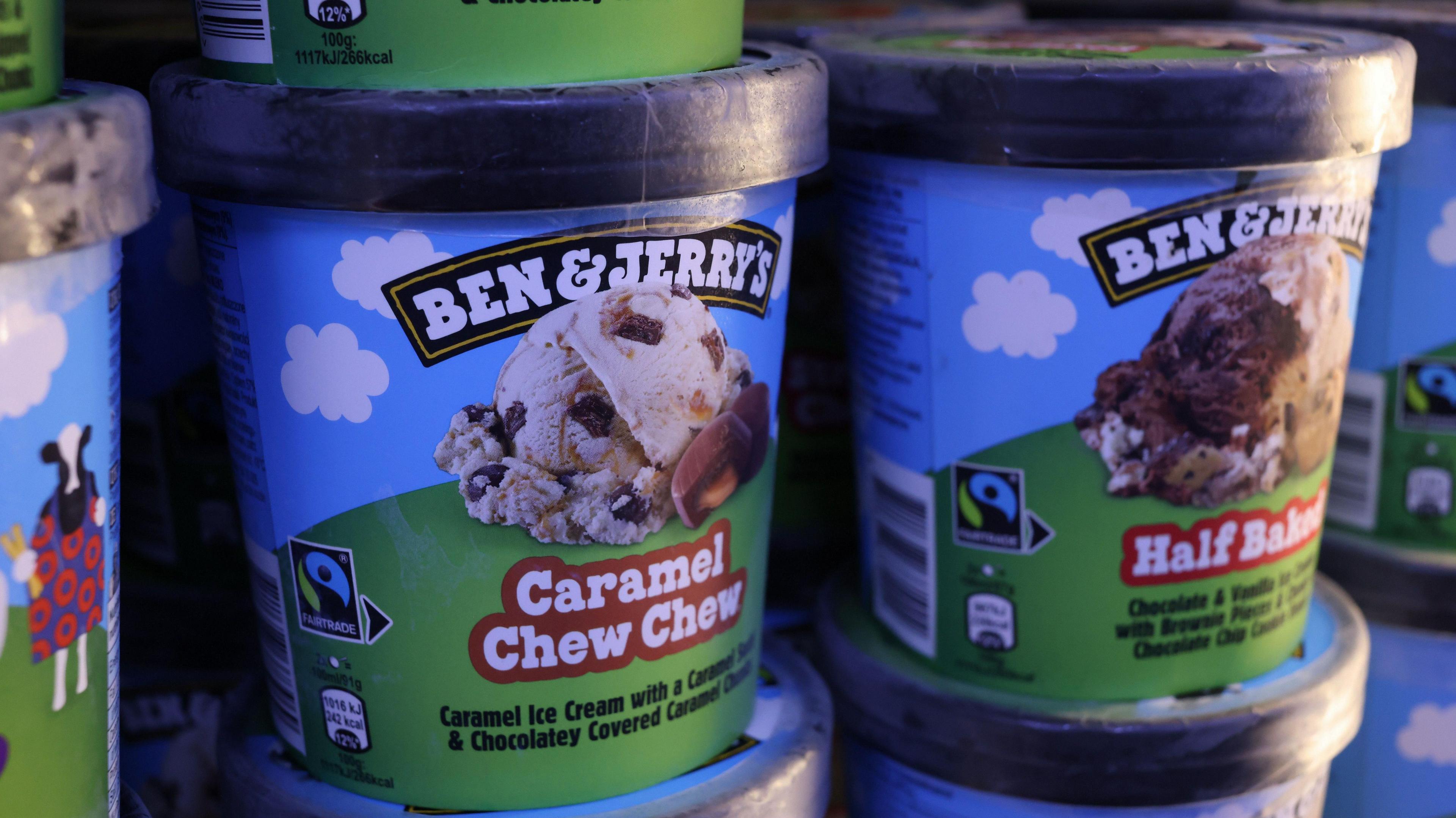 Tubs of Ben & Jerry's ice cream in a store freezer in London, UK.