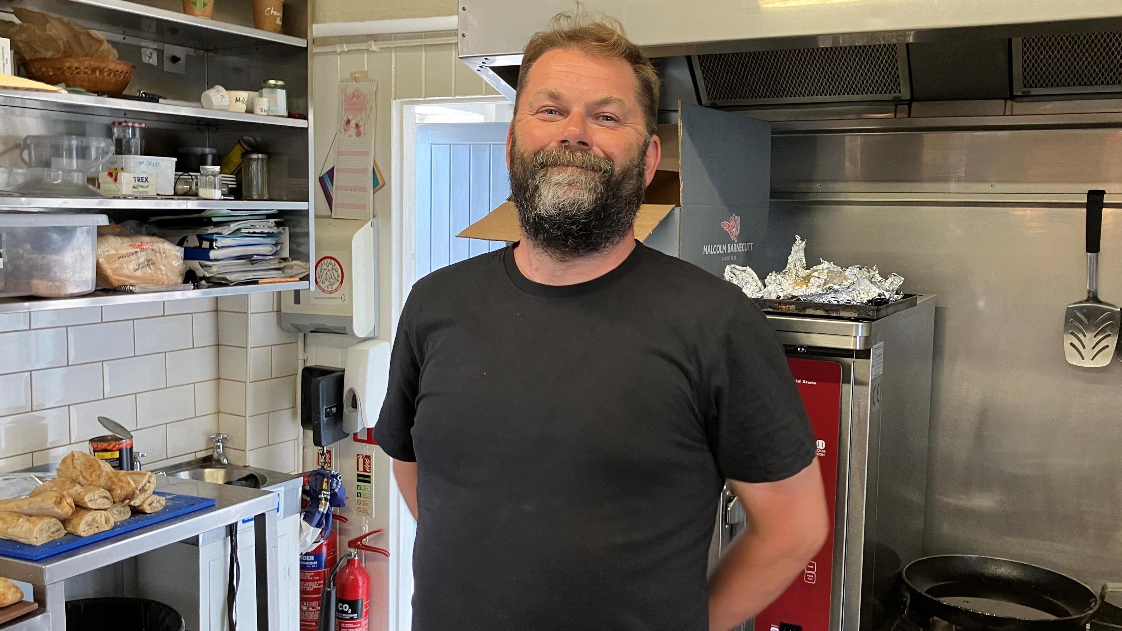 Man standing in Kitchen 