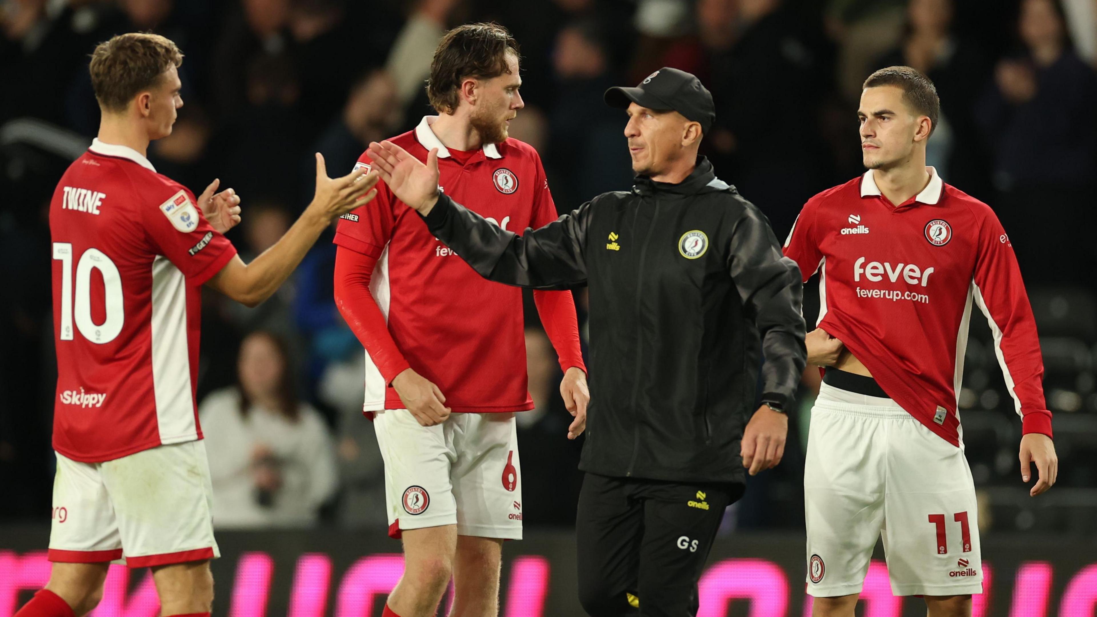 Gerhard Struber greets his Bristol City players after the draw at Derby County